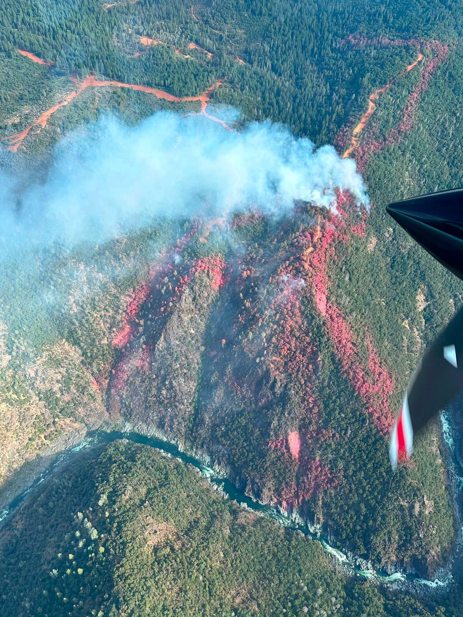 Smoke rises from the Chute Fire above the steep canyon near Dobbins on July 21. Credit: CAL FIRE NEU.