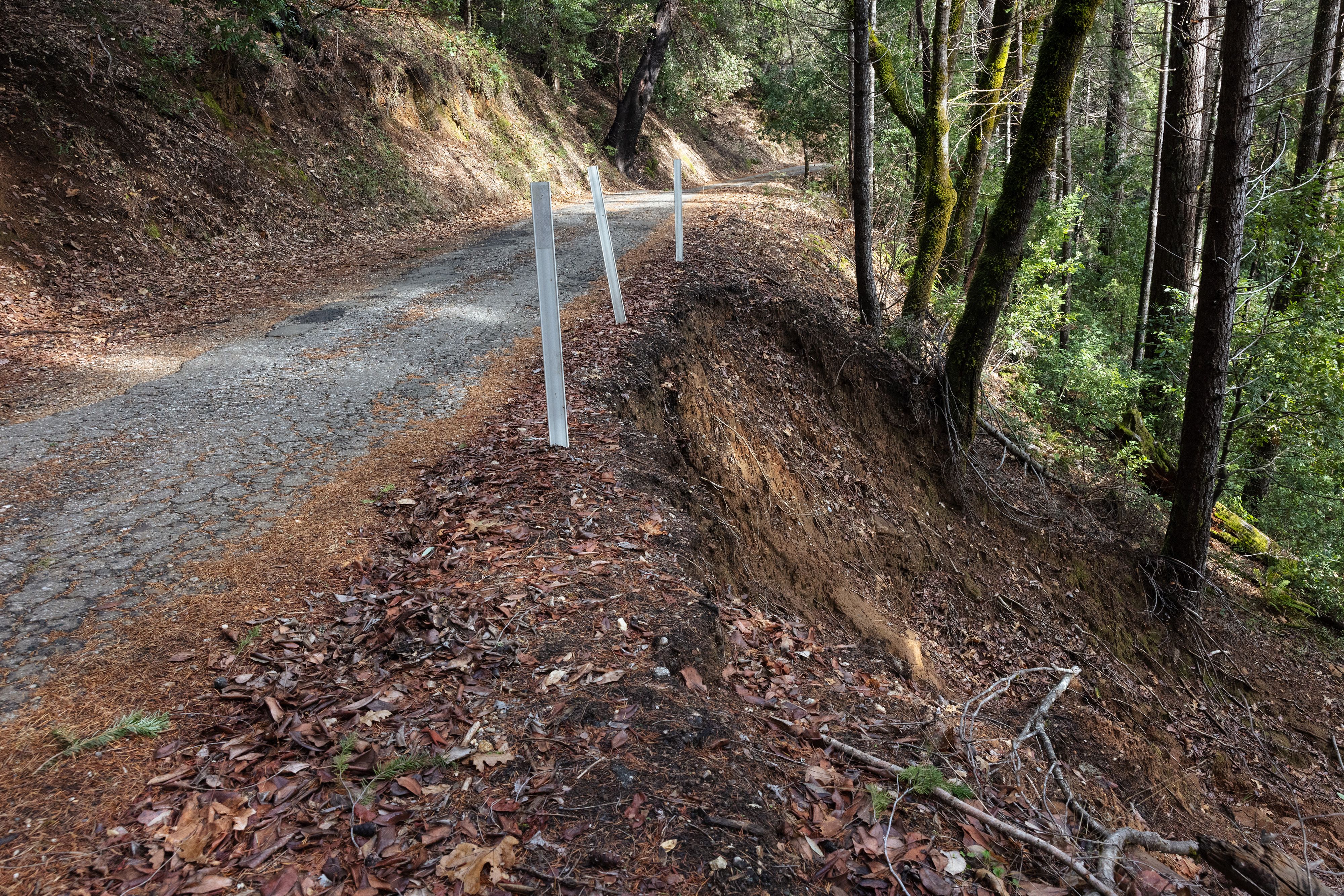A slide on Pendola Road encroaches on the roadway, causing the closure