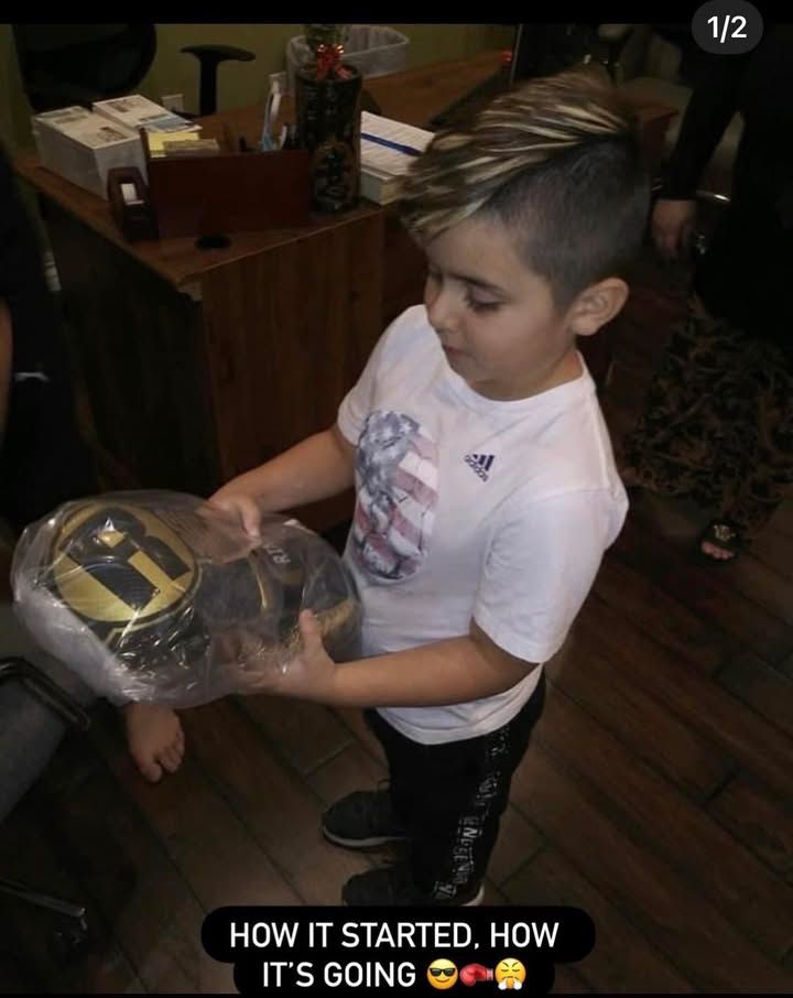 Max receives boxing gloves at 7 years old. Credit: Janett Abdulnour.