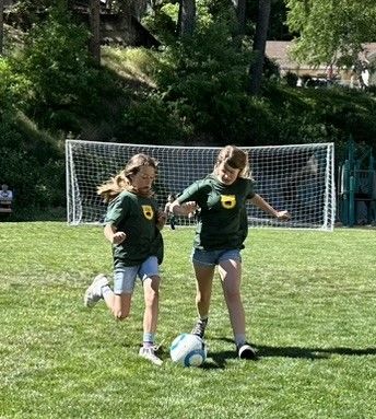 Chloe Knoefler and Abby Mooers battle for the ball