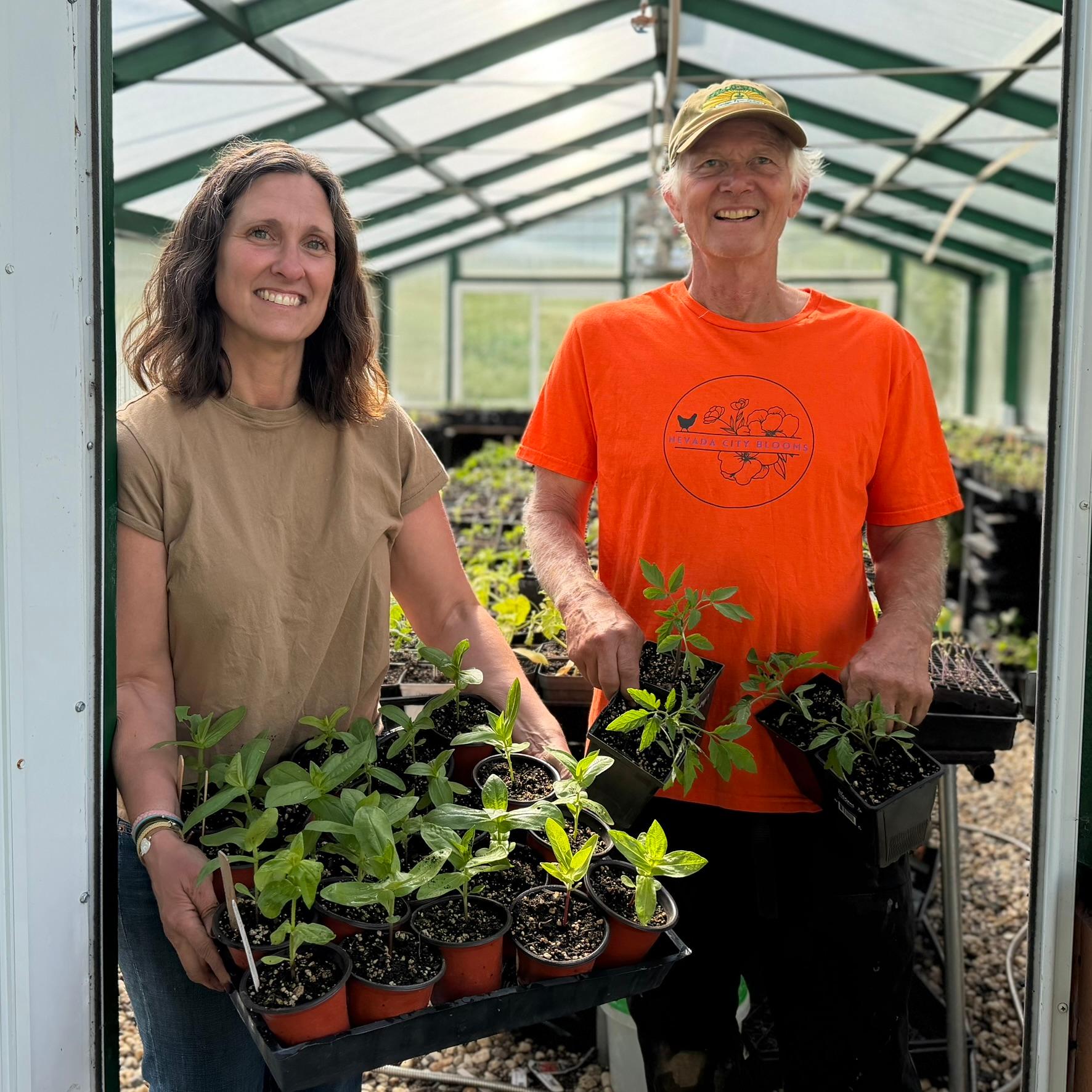 Leo Chapman and Rebecca Mooers prepping for the Plant Sale.