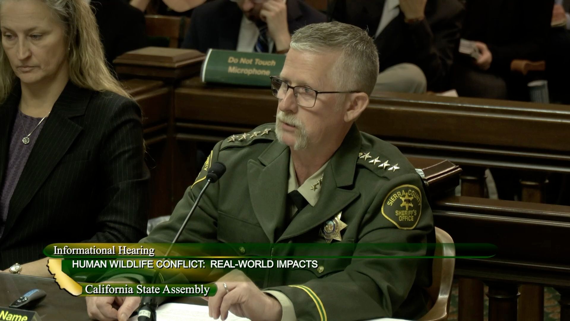 Sierra County Sheriff Mike Fisher testifies before the Water, Parks, and Wildlife Committee.