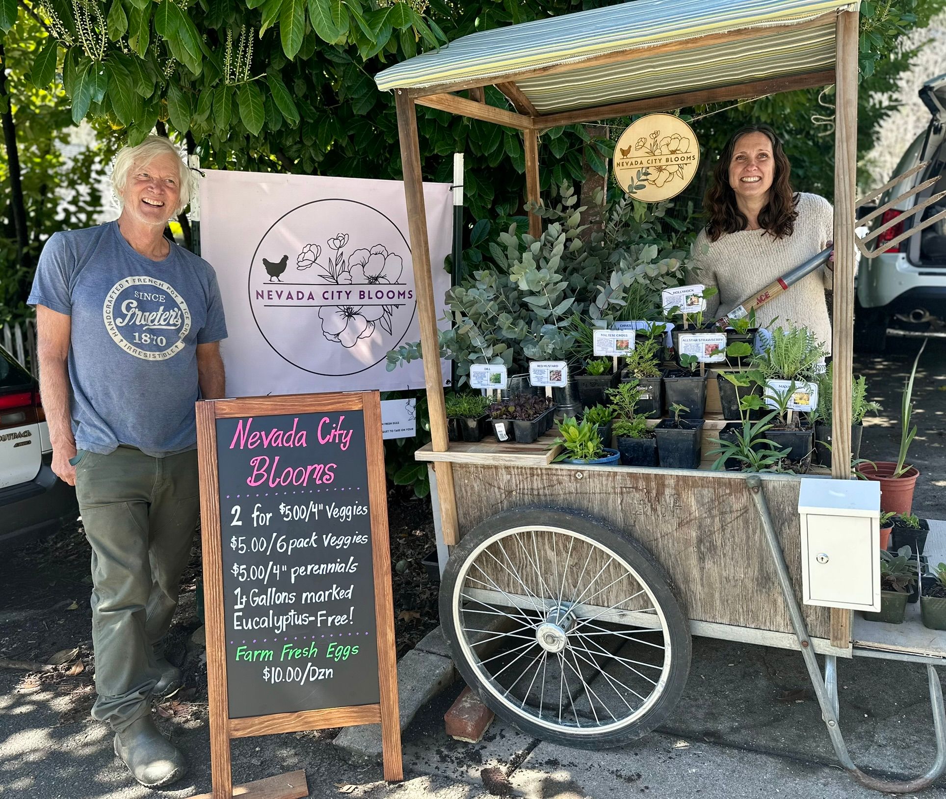 Leo and Rebecca and their pop-up garden cart.