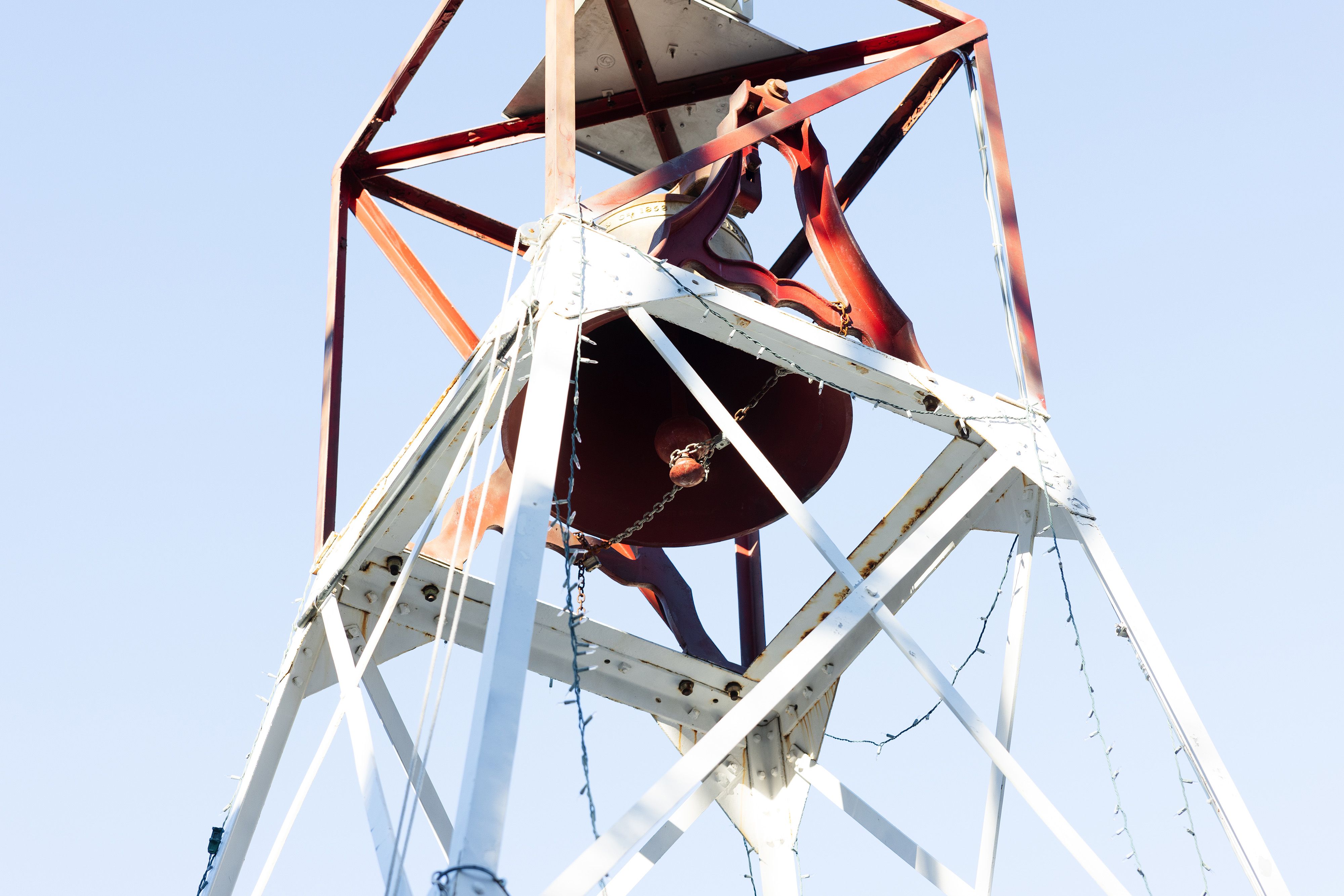 The clapper of the Downieville bell chained and locked.