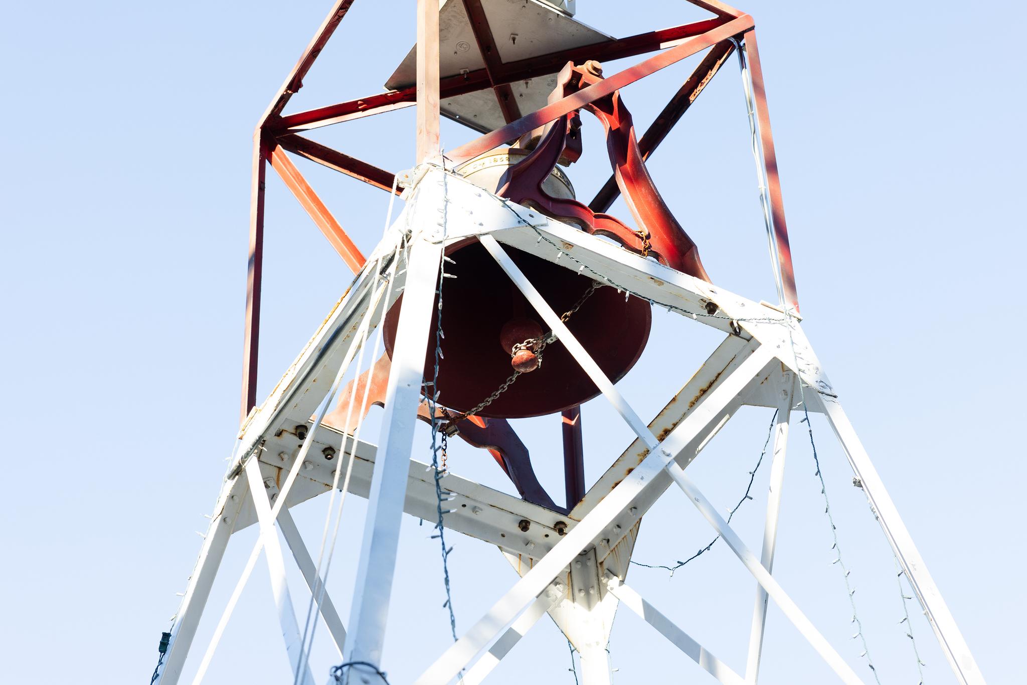 The clapper of the Downieville bell chained and locked.