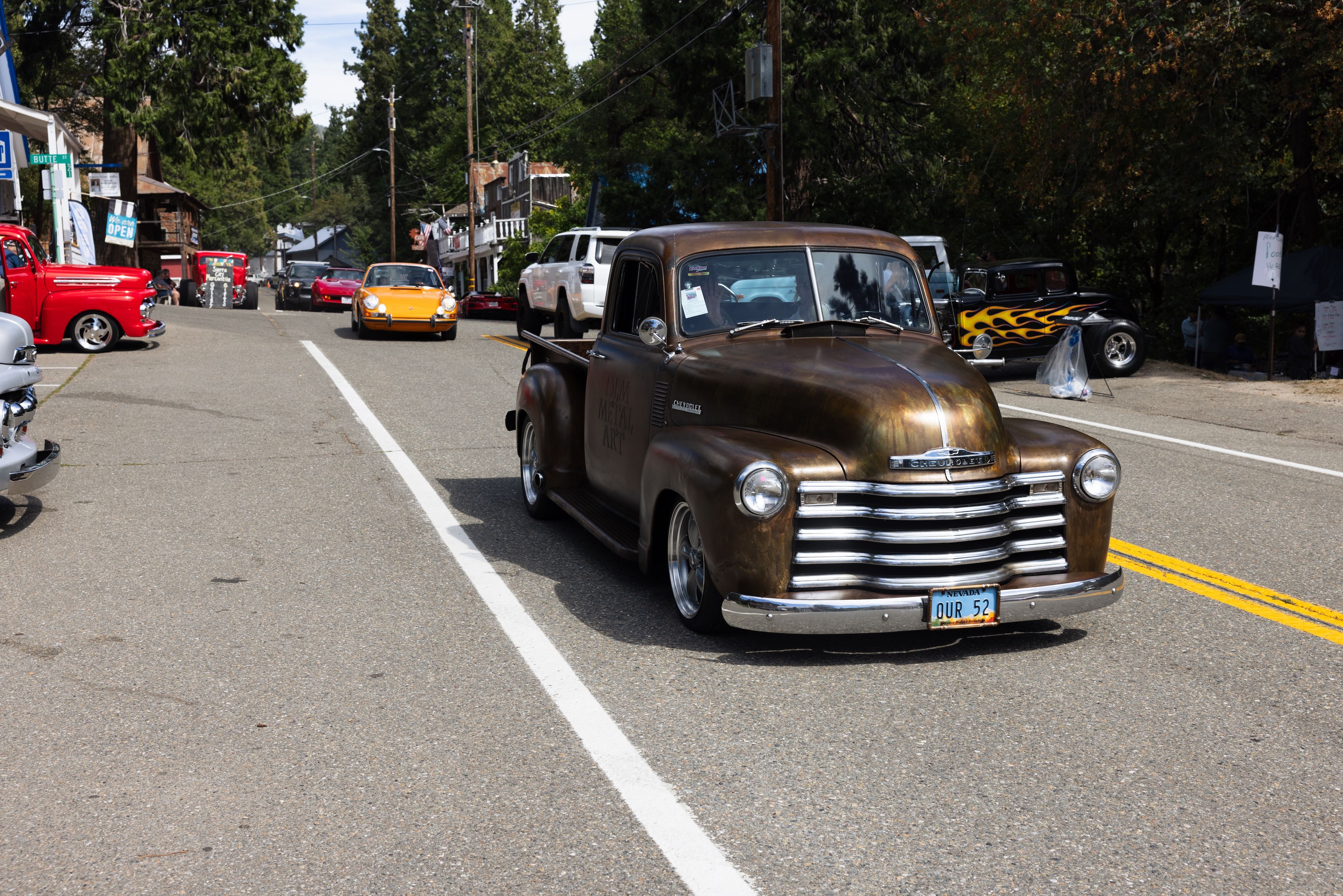 Classic cars parade down Sierra City’s Main Street during the 2024 Big City Rod Run.
