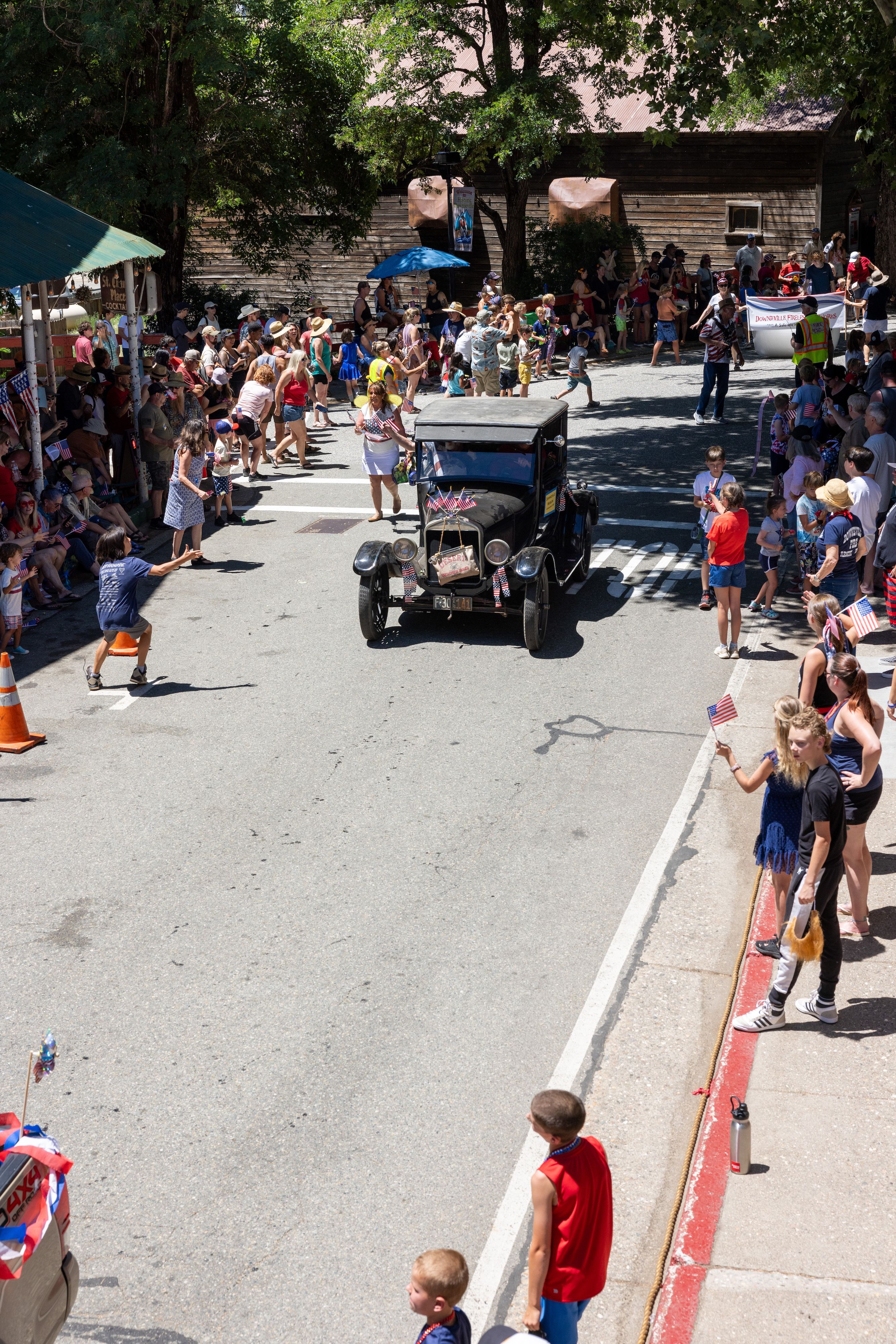Supervisor Lee Adams drives his car representing the Downieville Museum