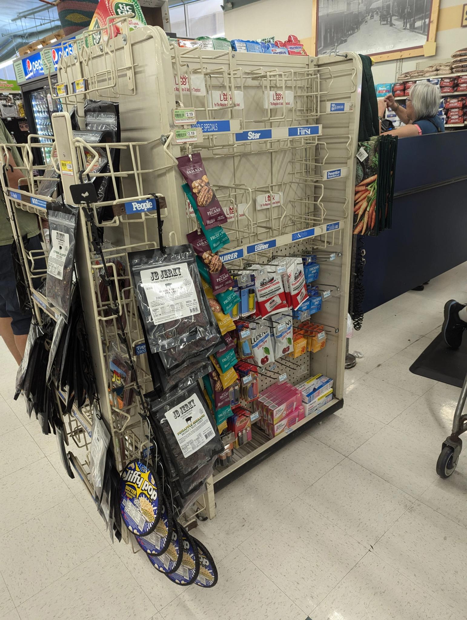 SPD Market, Nevada City – Empty magazine racks signal a change at checkout.