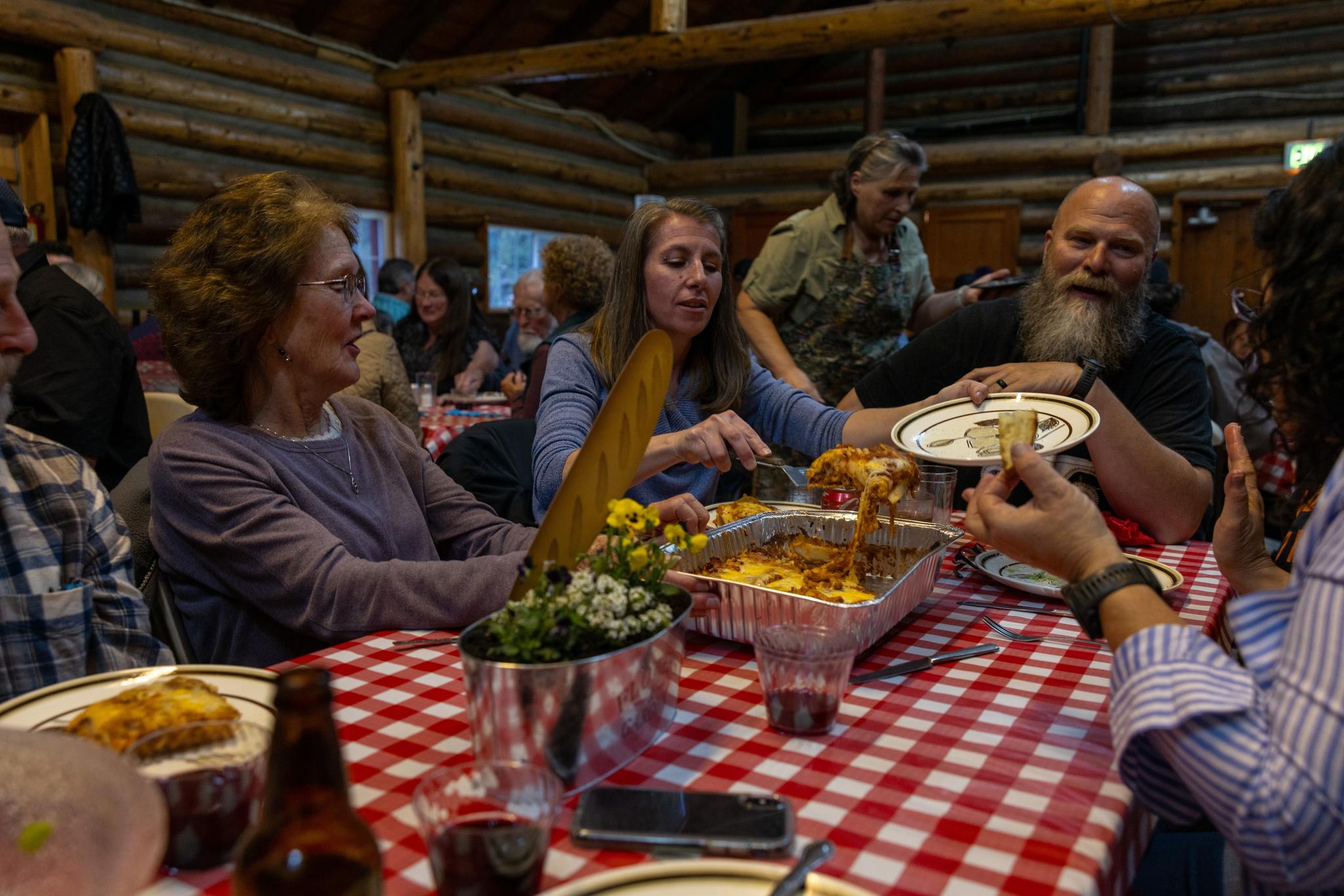 Lasagna served family style. Background: Chef Vicki Glenn