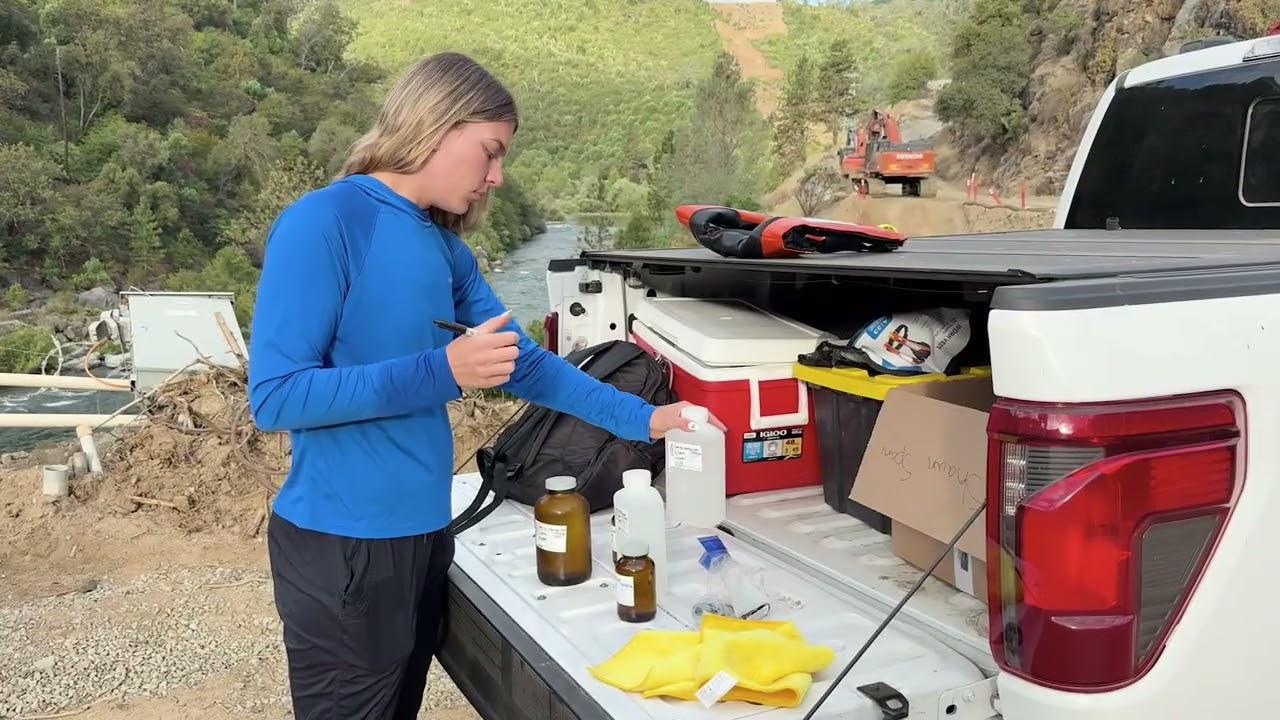 Yuba Water environmental scientist Shawn Spani prepares water samples for laboratory analysis at the New Colgate Powerhouse site. Photo: Yuba Water Agency.