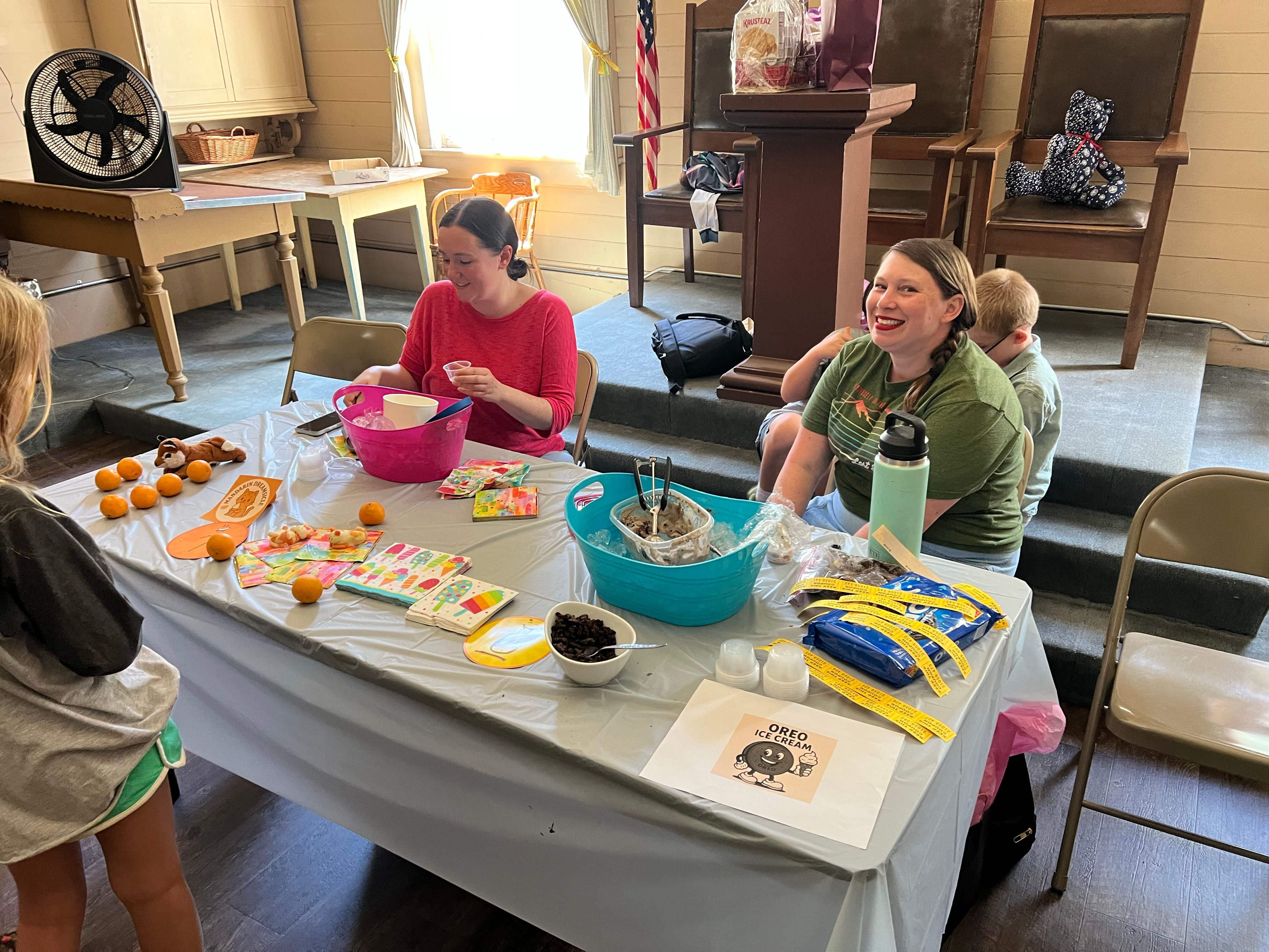 Tessa Jackson (left) and Theresa Haddow (right) serve their first and third place ice creams.