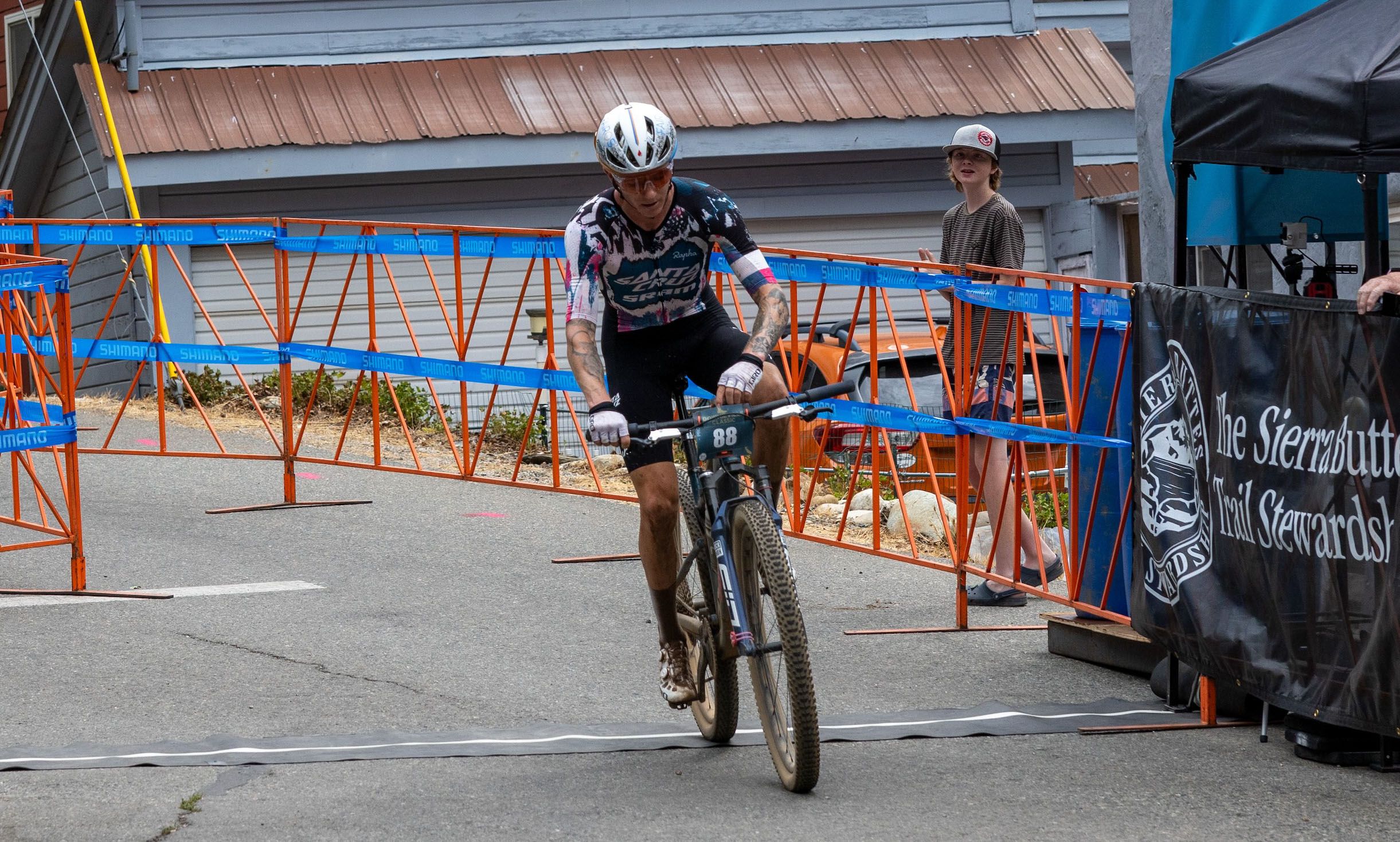 Keegan Swenson, 2024 all-mountain race winner, crosses the finish line for the cross-country race.