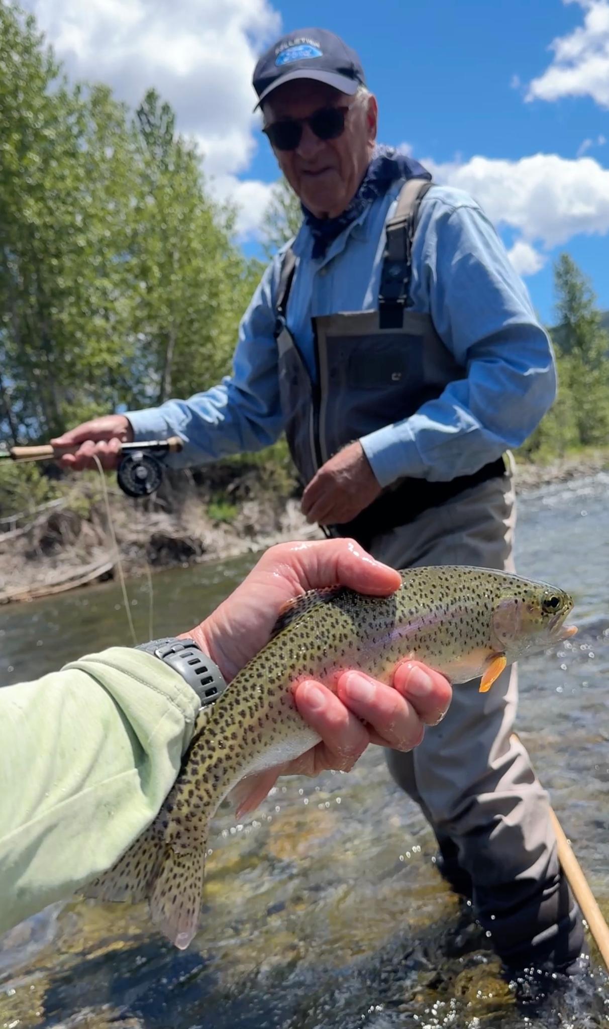 Lenny with a trout caught in the Finn River.