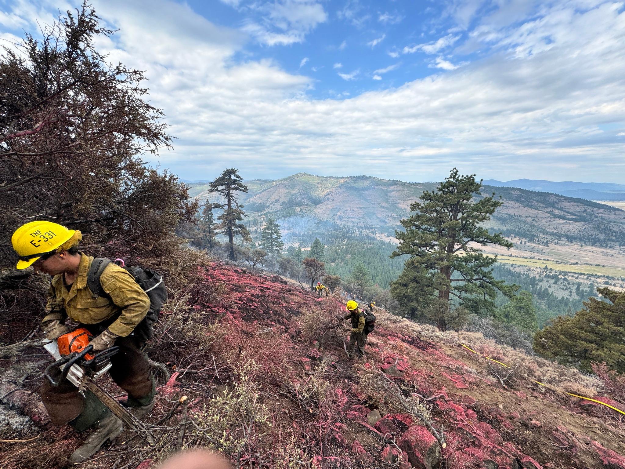 Forest Service firefighters establish a firebreak in the Tahoe National Forest. Photo by U.S. Forest Service.