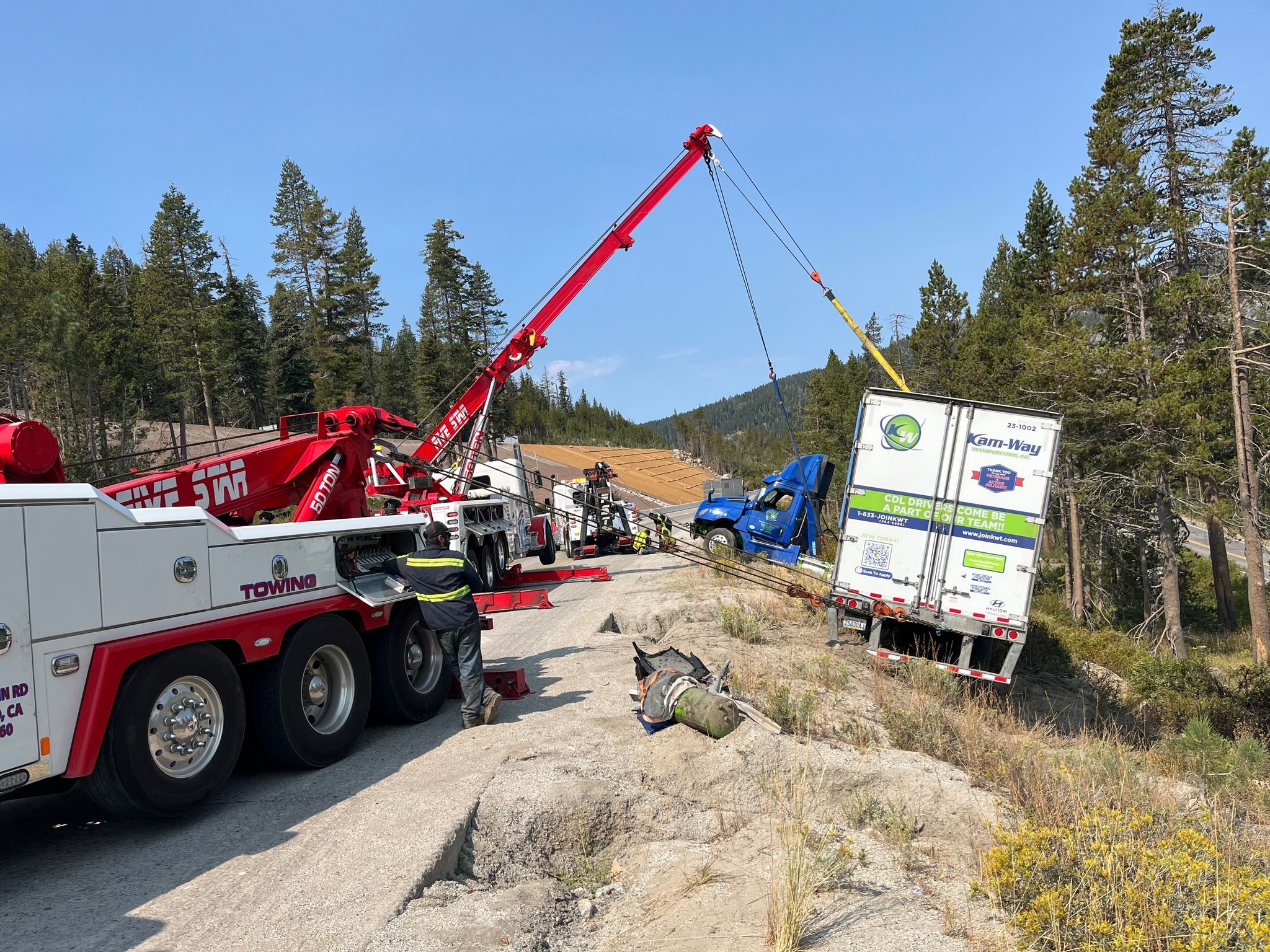 Photo of the truck being extracted shared by Caltrans District 3 at around 11:15 PM.