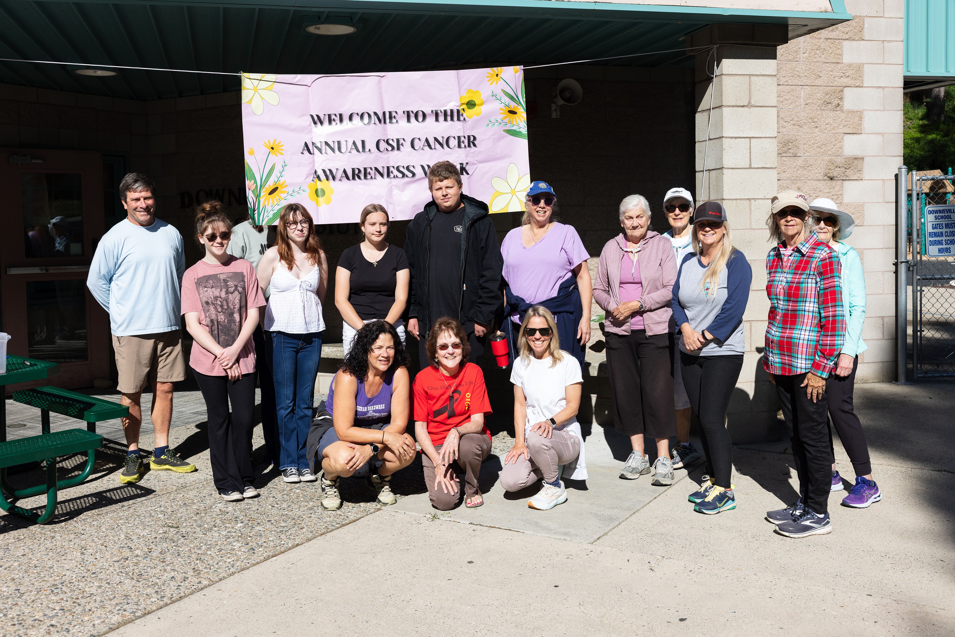 Cancer walk participants and organizers at the Downieville School gym.