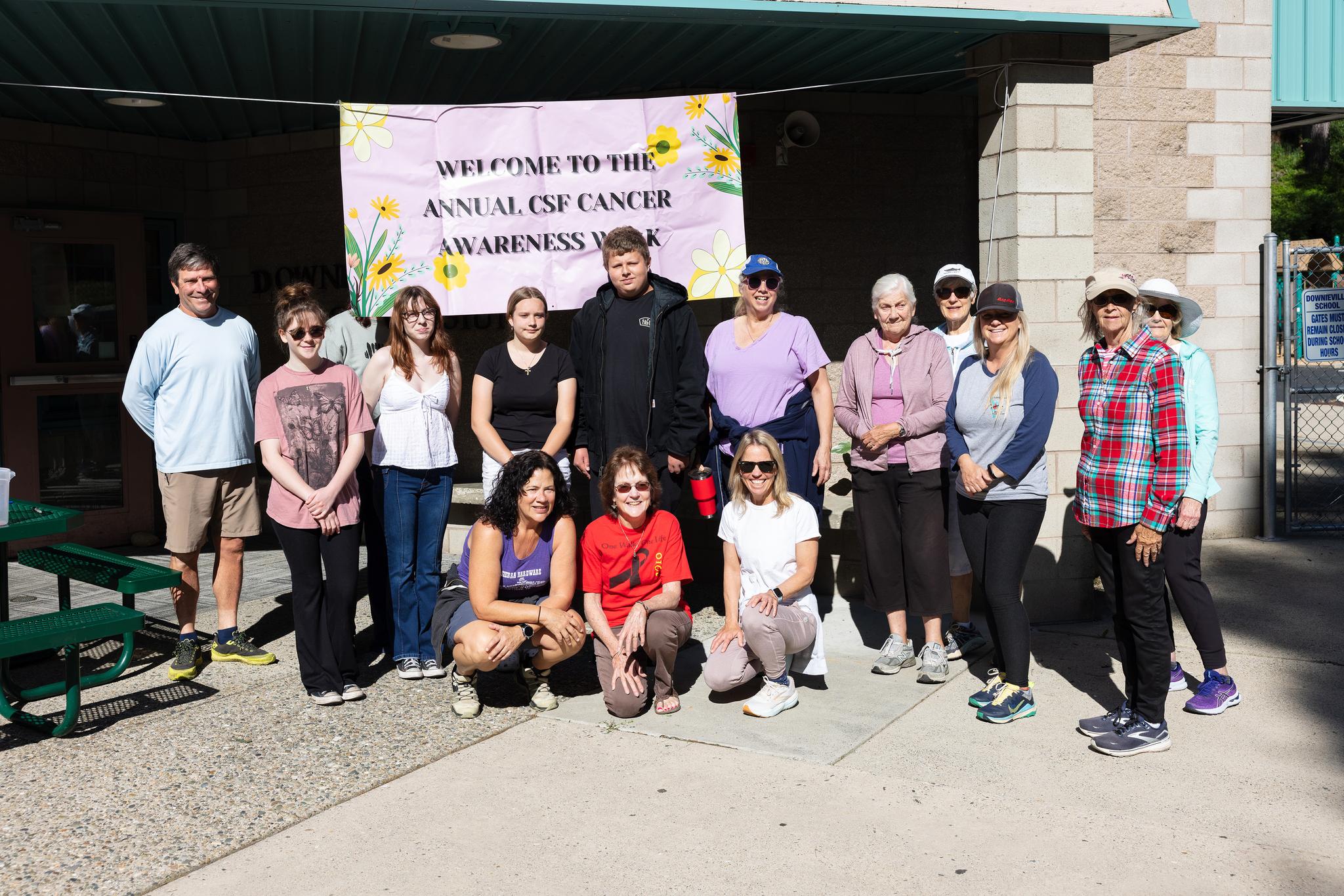 Cancer walk participants and organizers at the Downieville School gym.