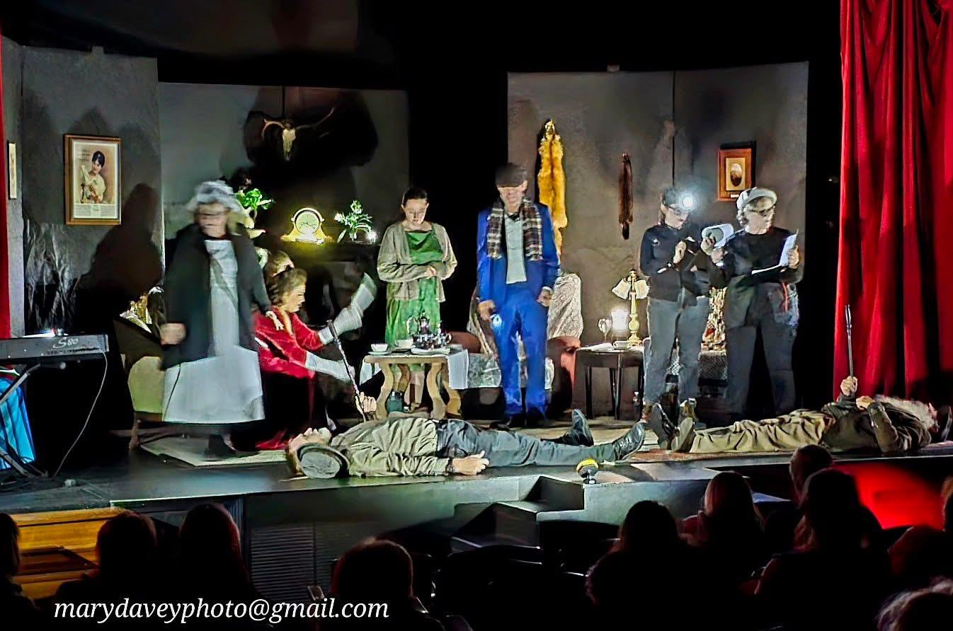 The cast makes do in the dark on Friday. Photo by Mary Davey.