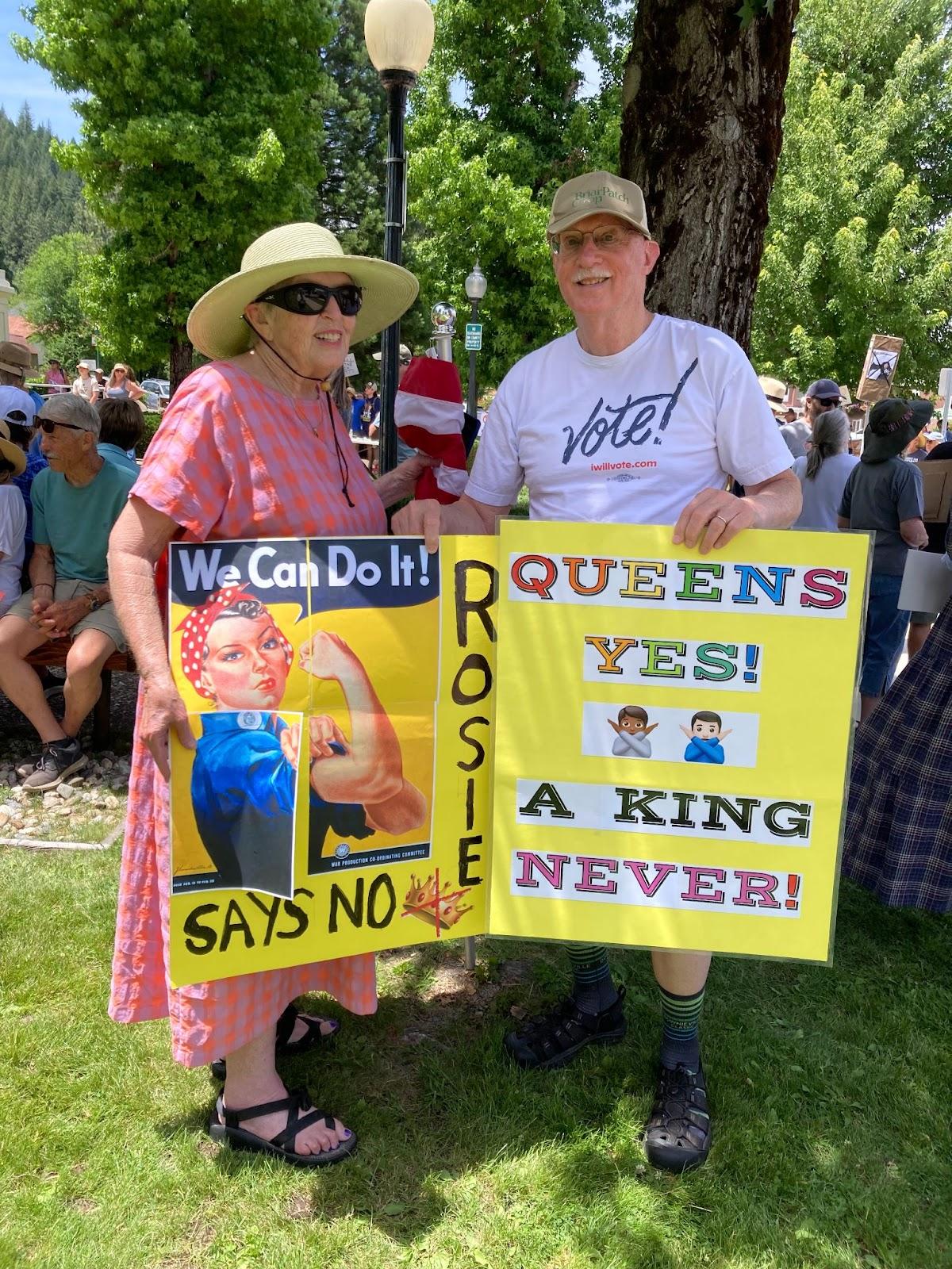 Linda and Paul Guffin, of Downieville, with their protest signs.