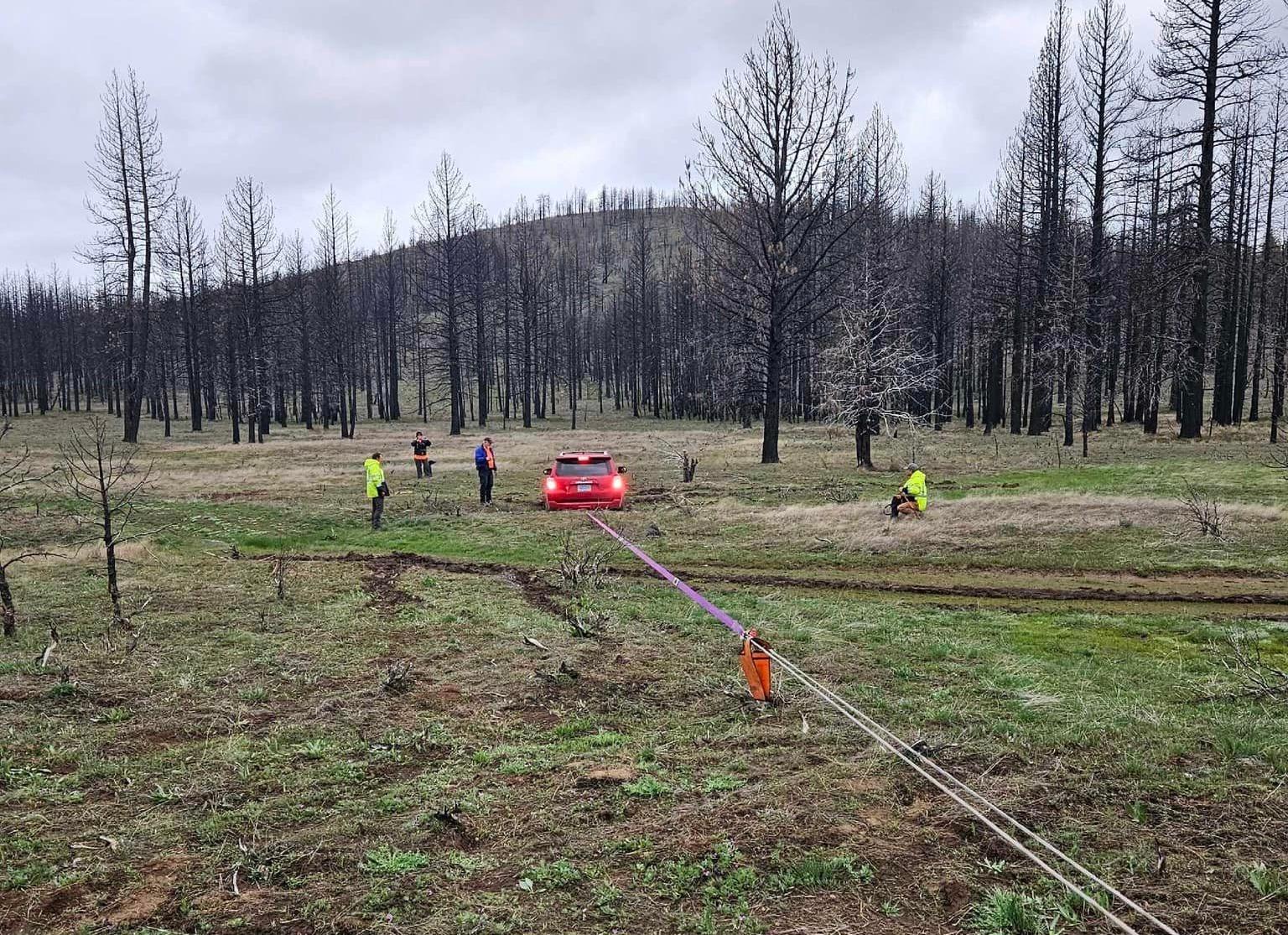 The first vehicle to be stuck is winched out by Search and Rescue