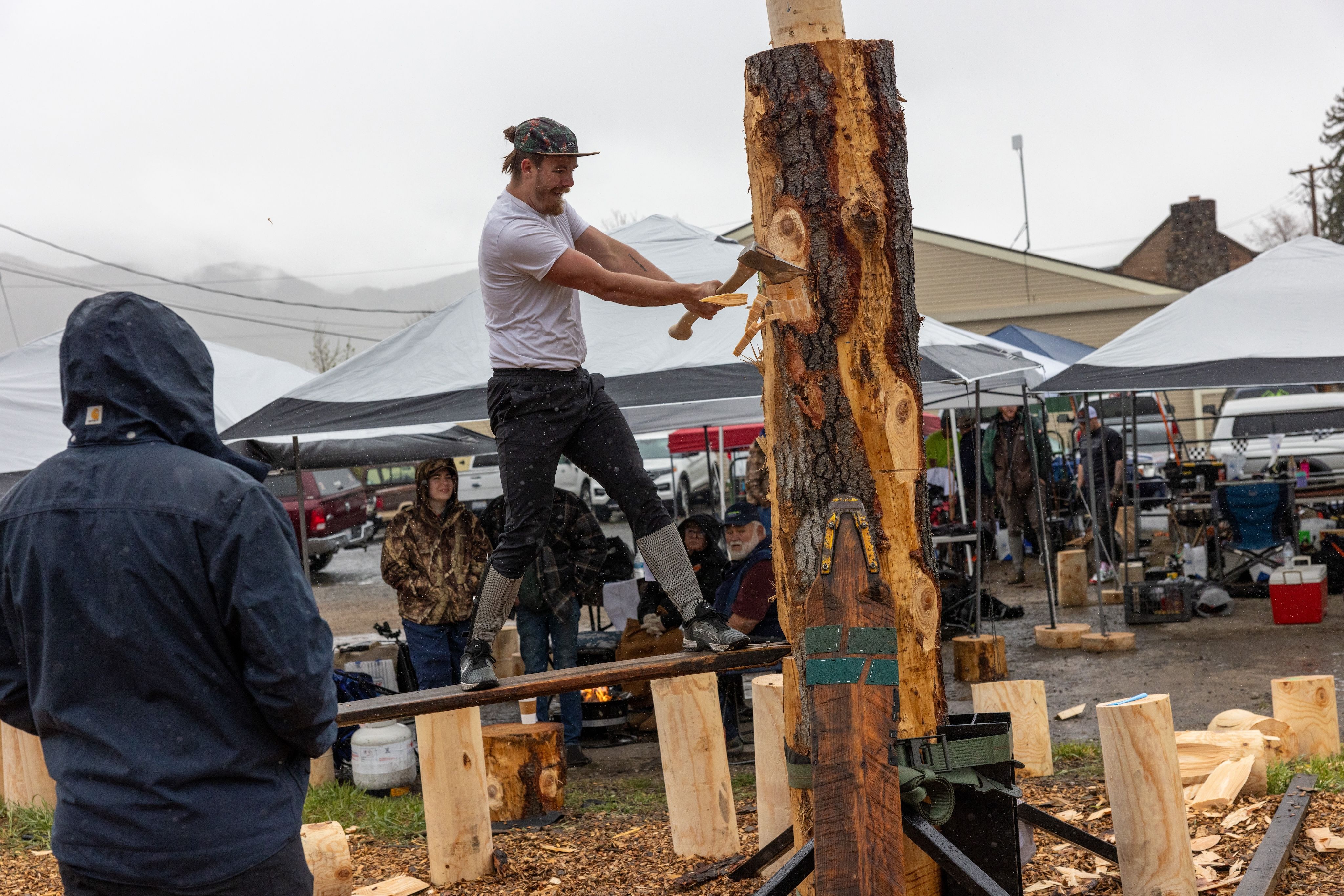 A competitor works on his second slot during the Springboard Chop
