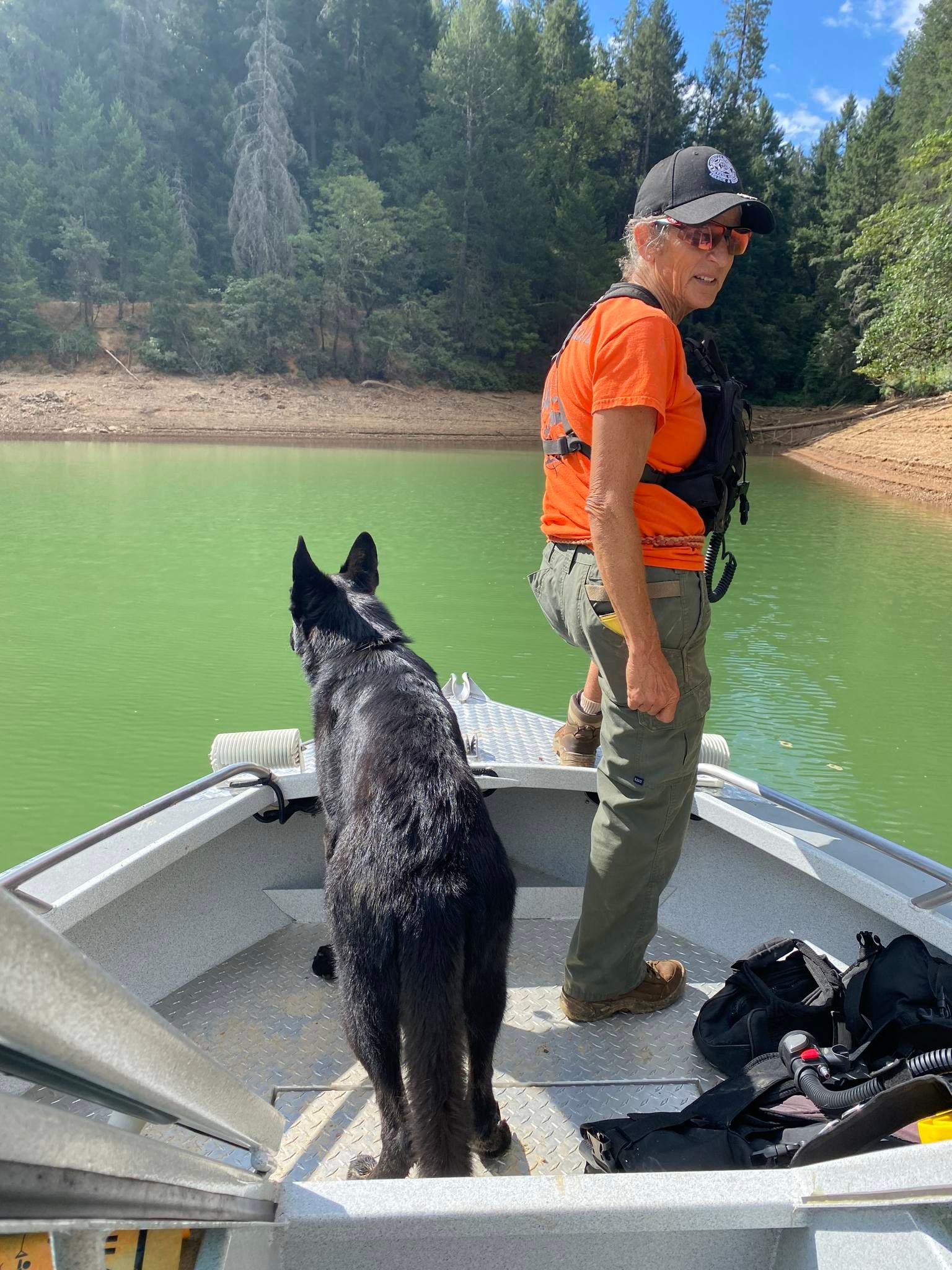 A Nevada County Search and Rescue worker patrols Rollins Lake with a cadaver dog. Photo by Nevada County Sheriff’s Office.