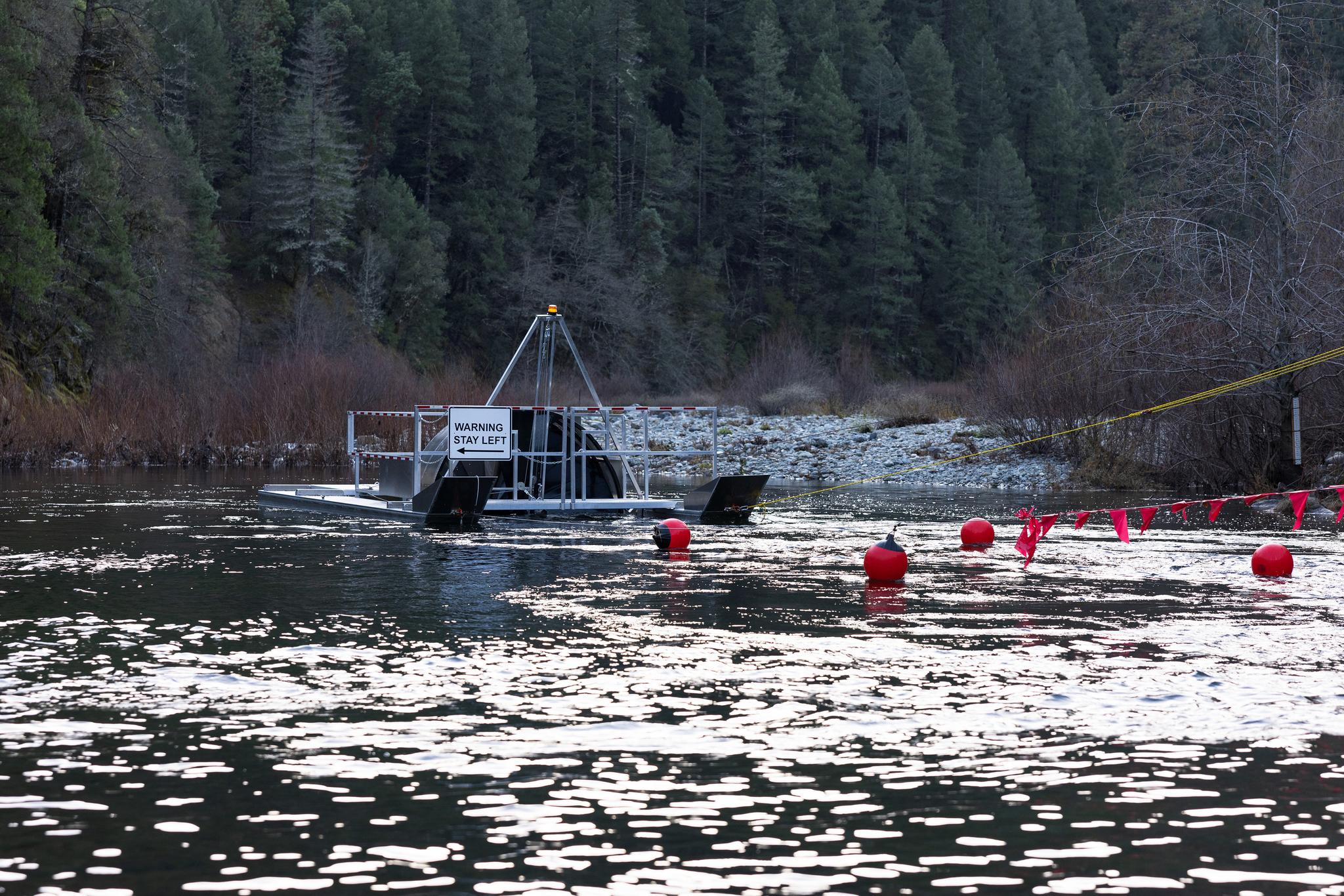 The installed rotary screw trap actively fishing the North Yuba River for spring-run Chinook salmon