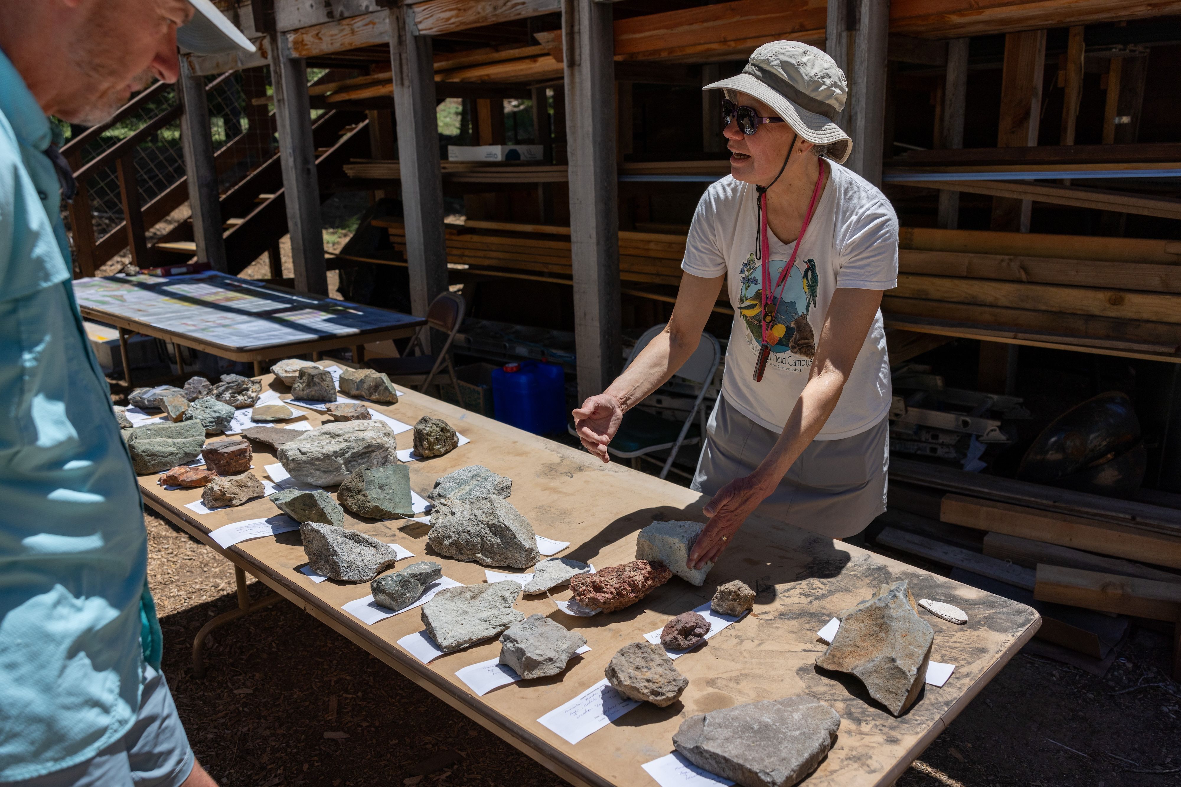 Course instructor and retired engineering geologist Betsy Mathieson displays locally collected rock samples
