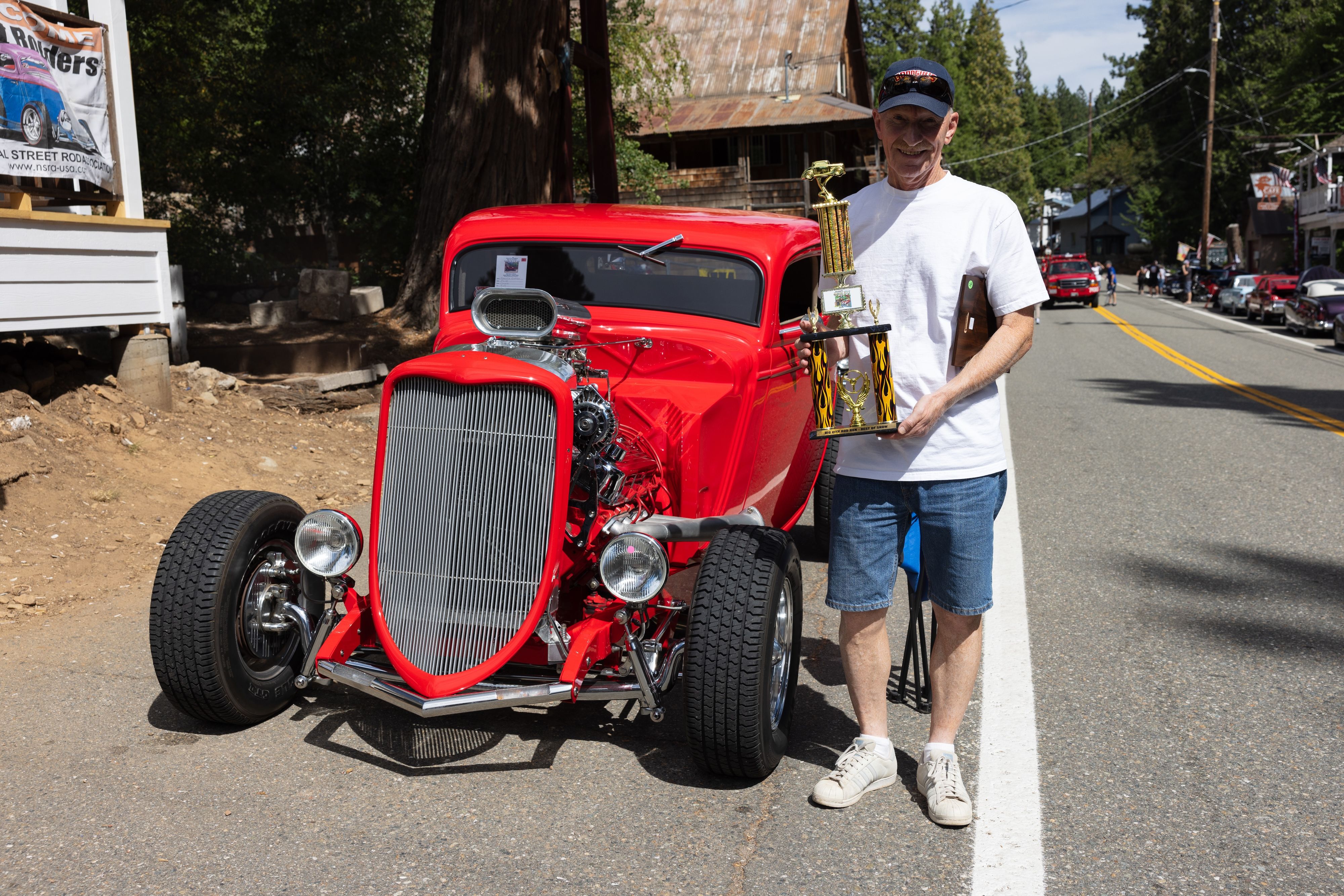 Charlie Catron next to his show-winning car