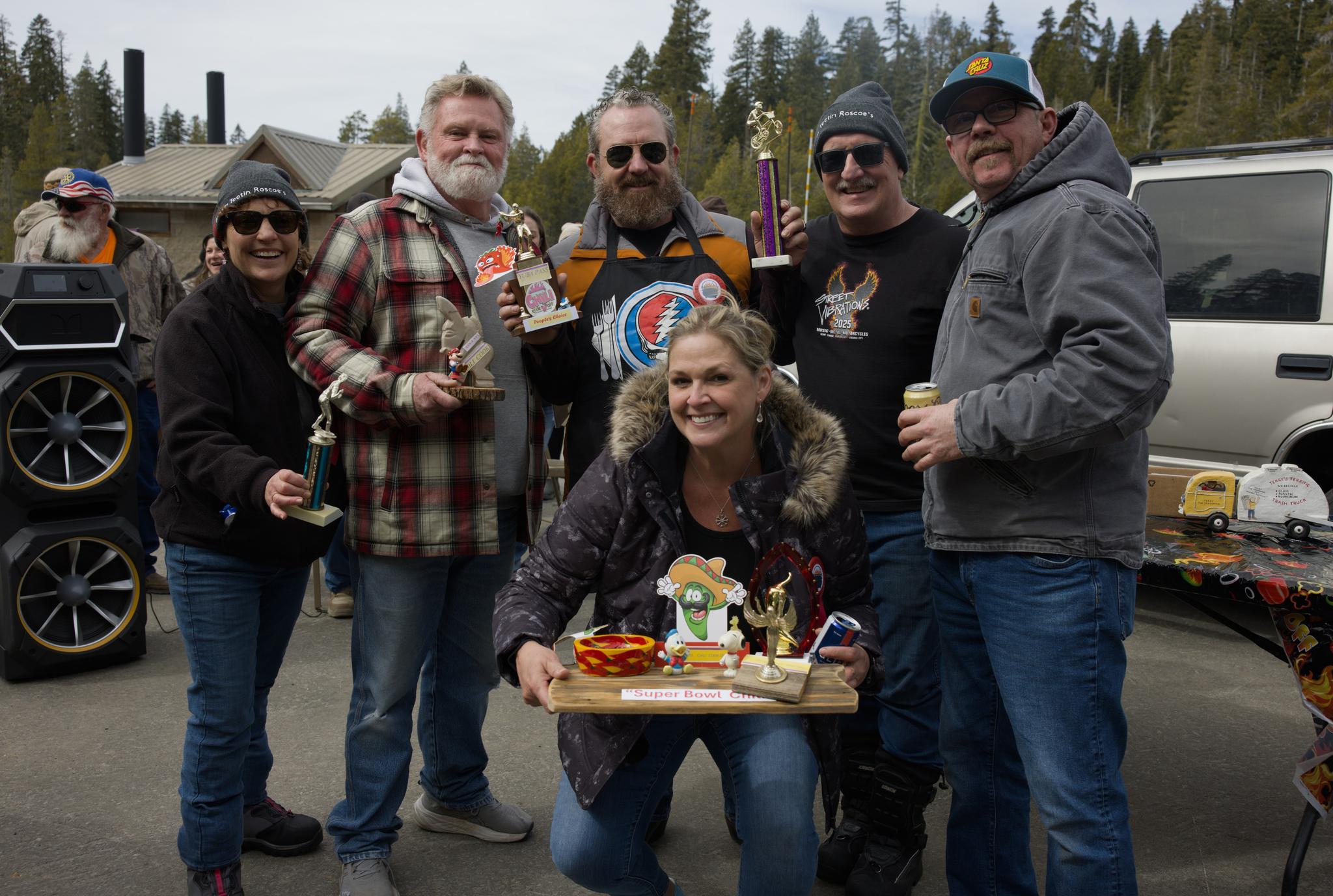 Several of the trophy winners in Saturday’s Great Yuba Pass Chili Cook-off gather after the award ceremony.
