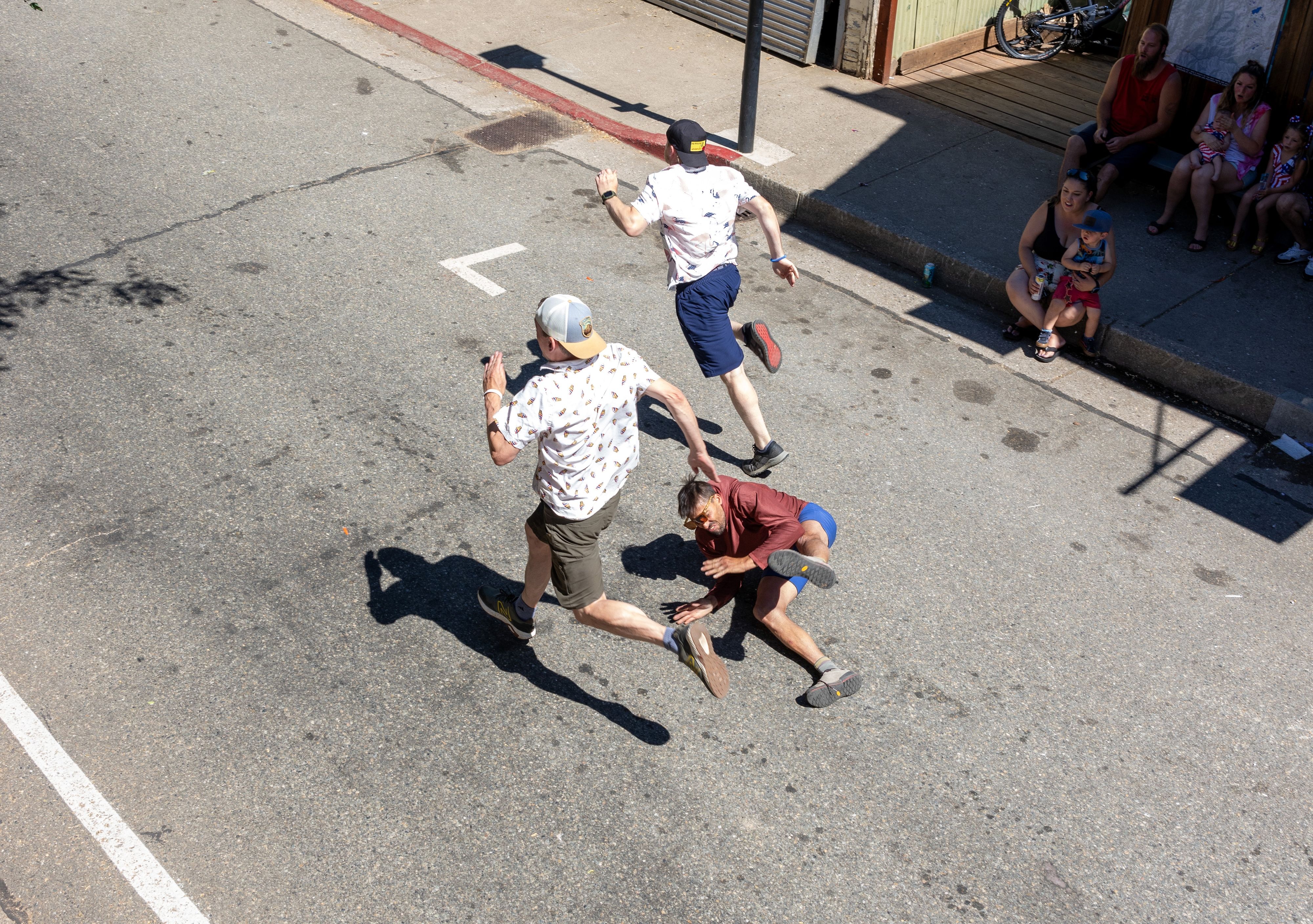 Andy Flores takes a spill in the 40-and-up men’s race