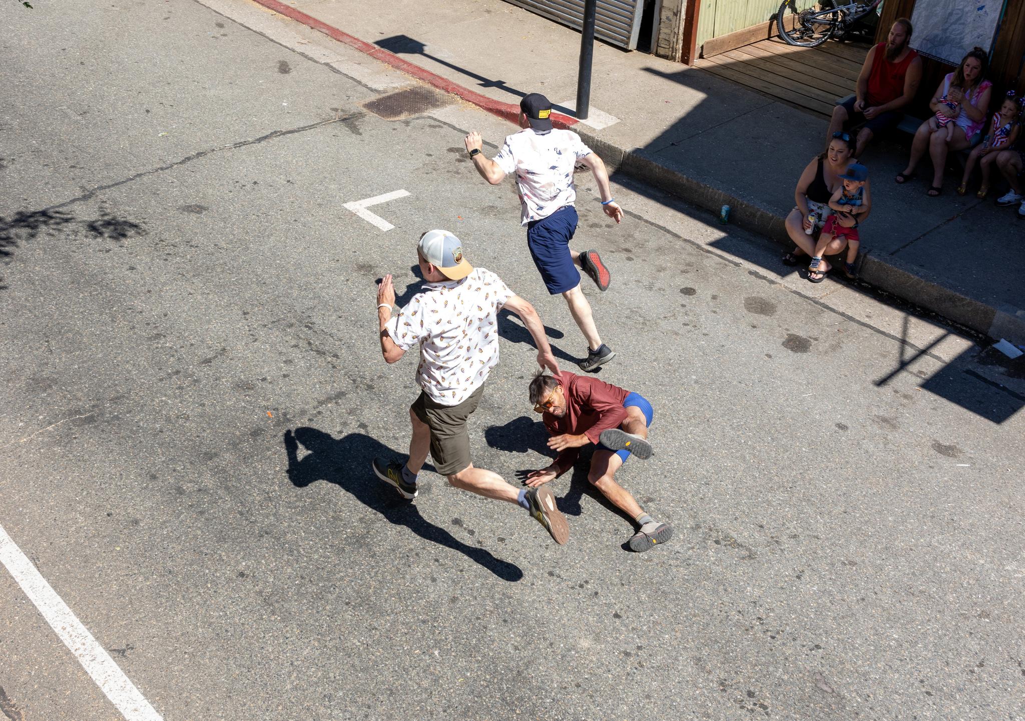 Andy Flores takes a spill in the 40-and-up men’s race
