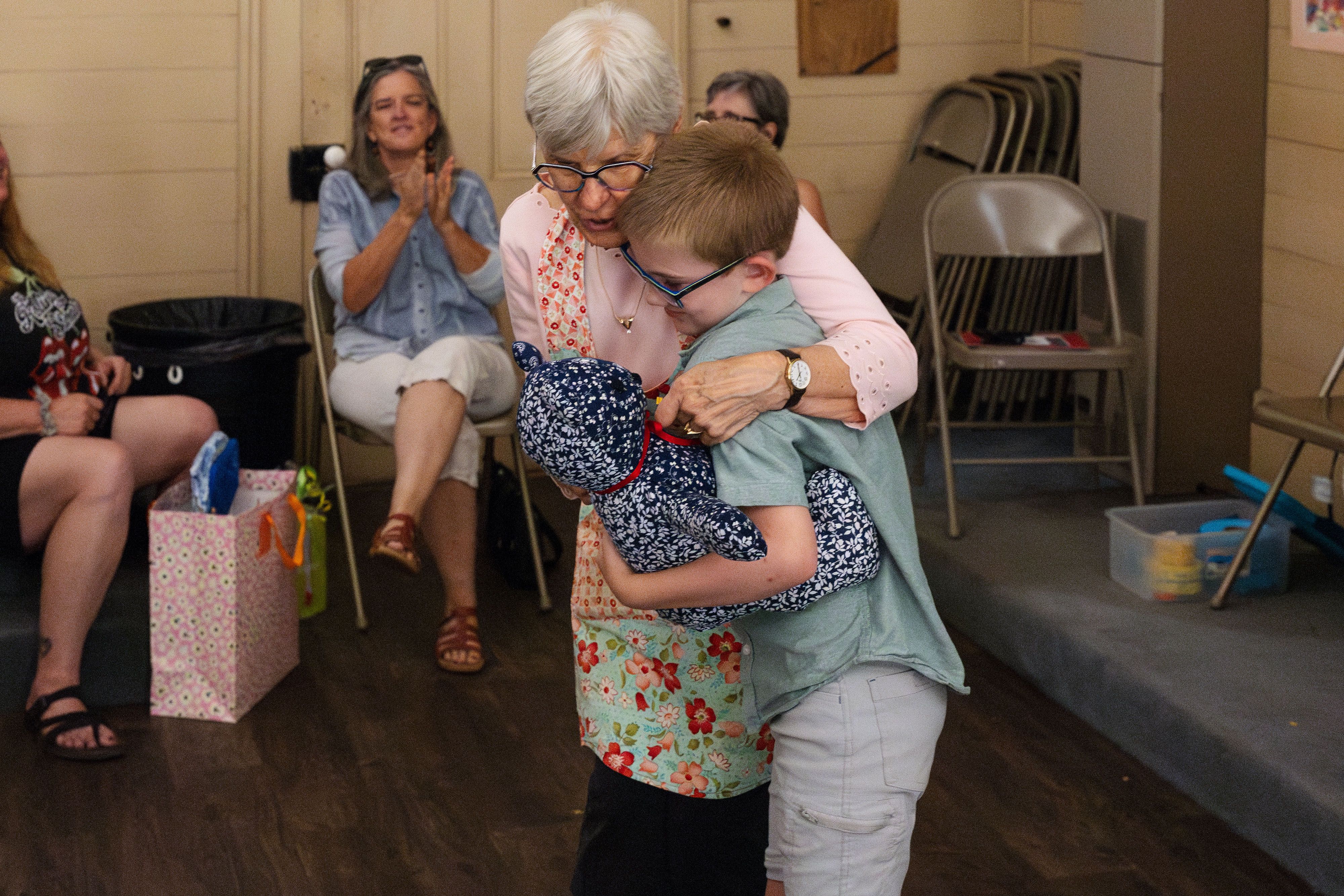 Euan Haddow wins Mr. Blueberry Bear, presented by Karen Galan.