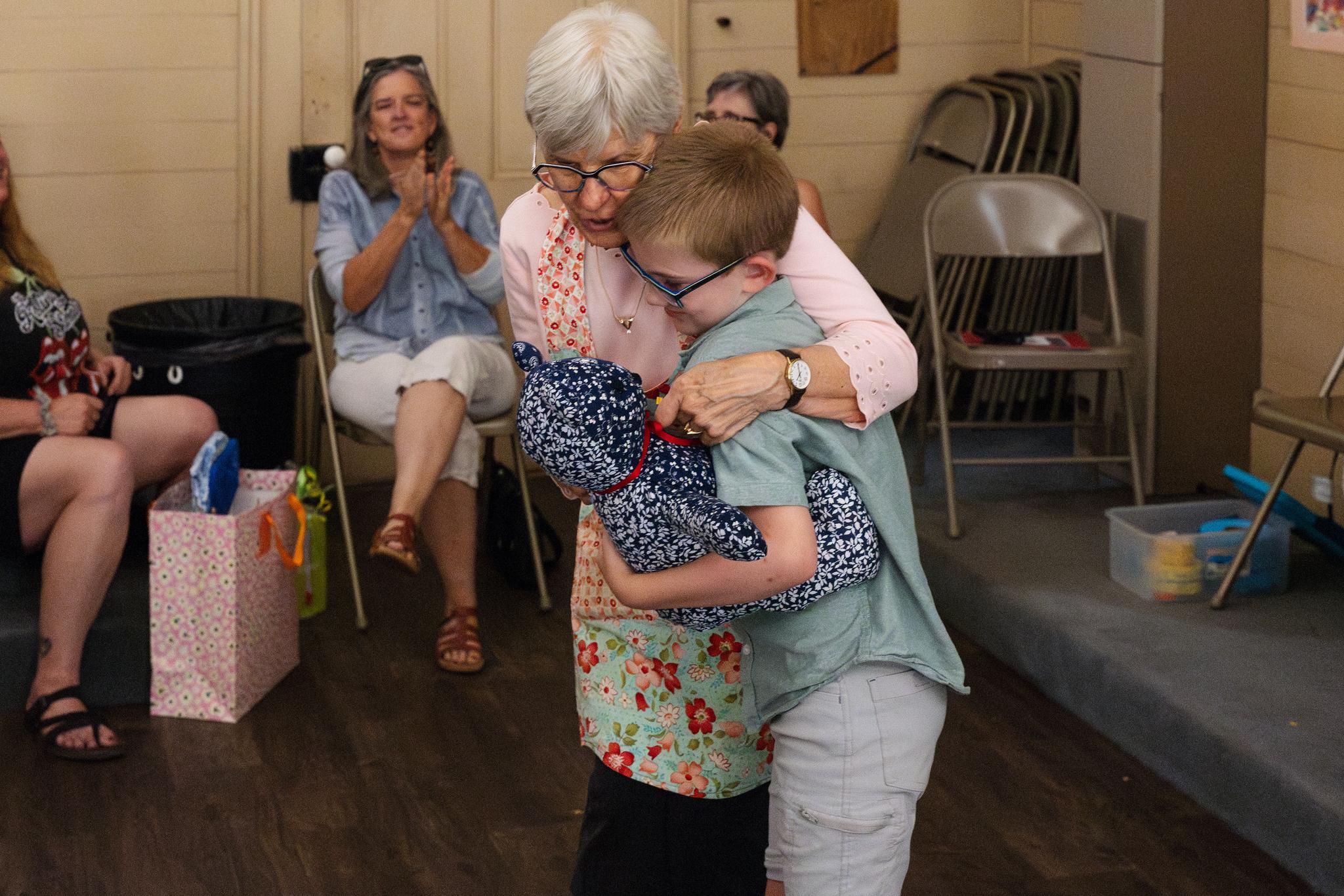 Euan Haddow wins Mr. Blueberry Bear, presented by Karen Galan.