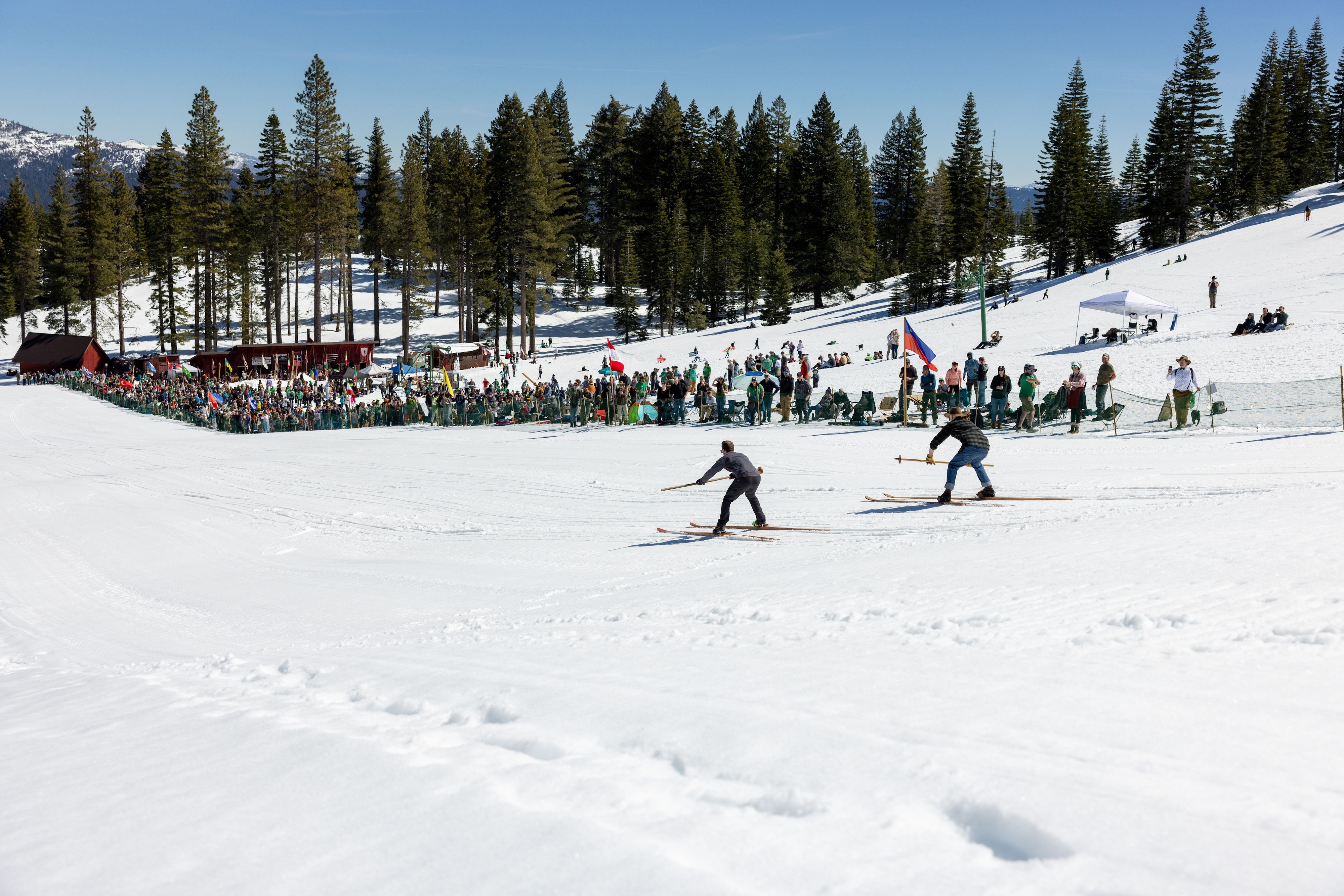 Racers tackle the hill in front of the crowd. More pictures on page 5.