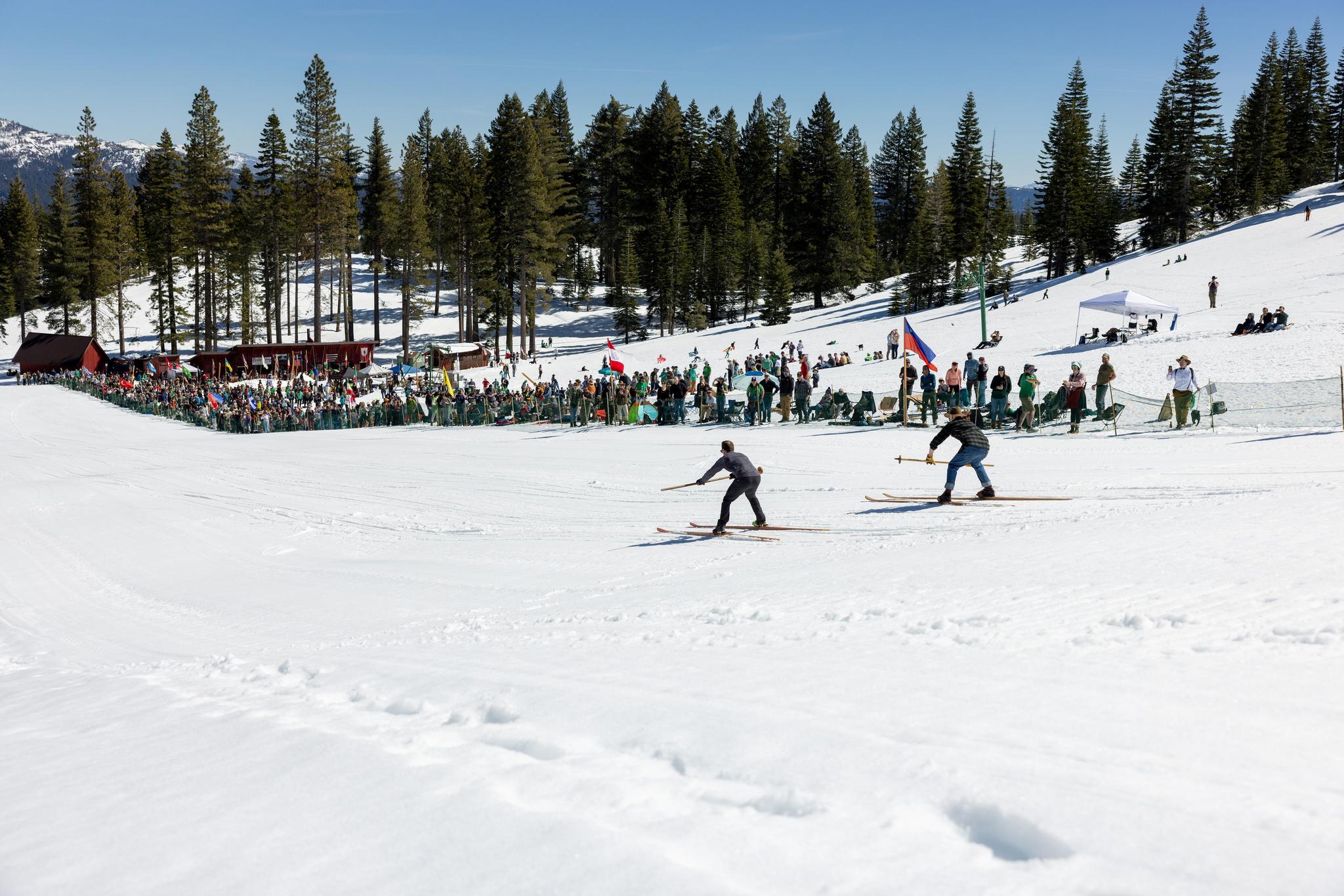 Racers tackle the hill in front of the crowd. More pictures on page 5.