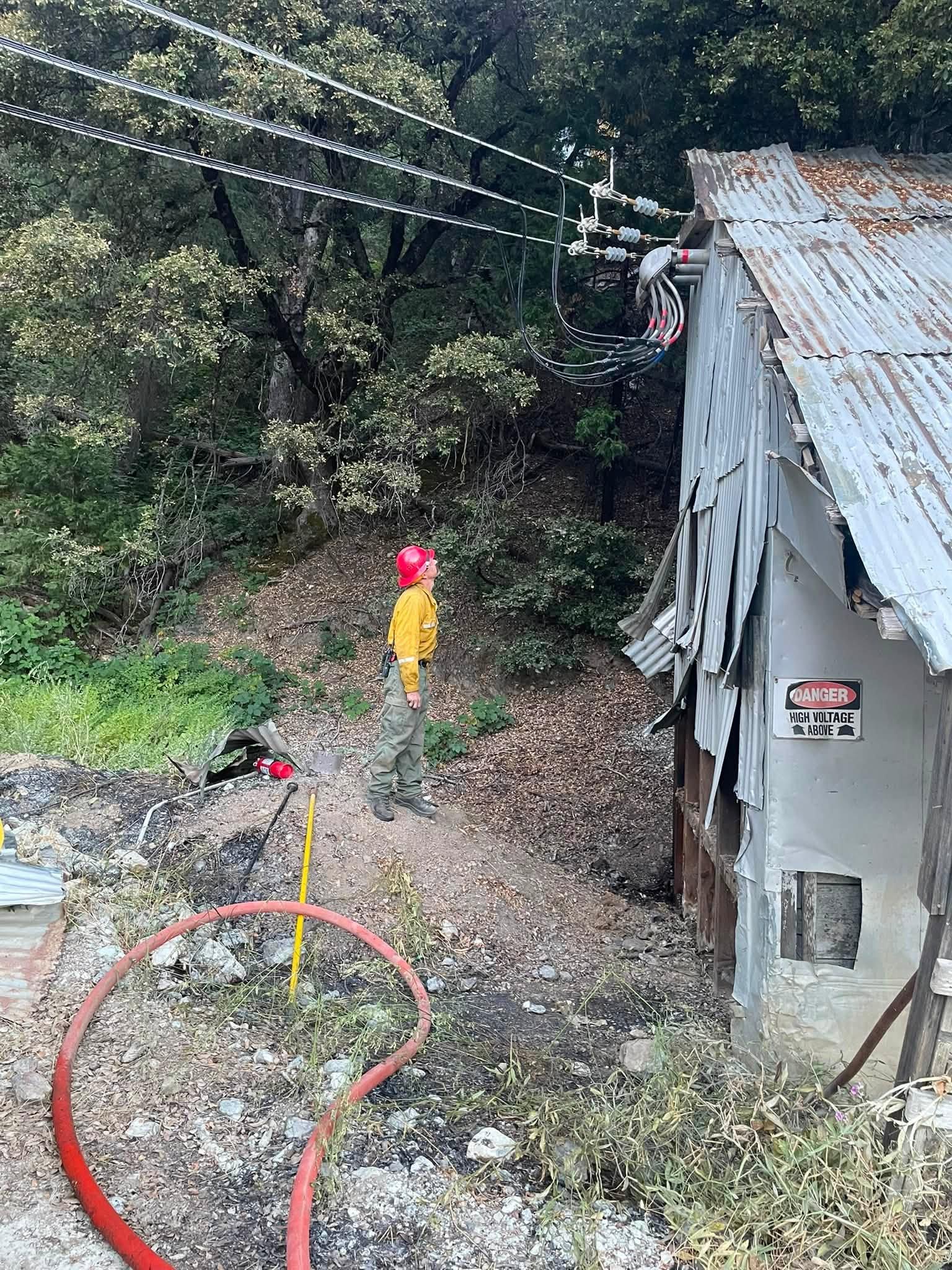 A firefighter inspects a weatherhead at the 16 to 1 mine. Credit: Pike City Fire Department.