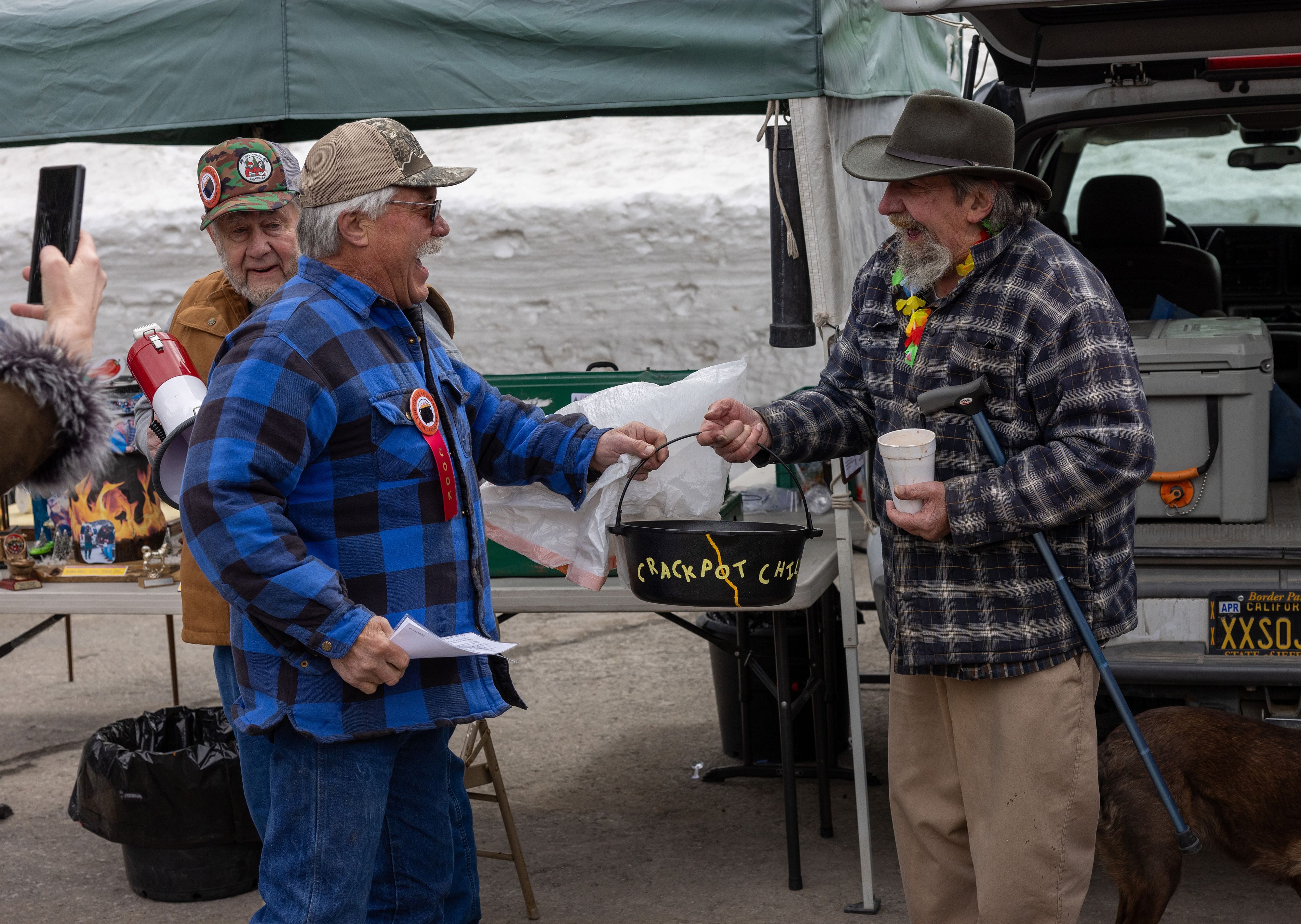 In 2024, five-time champion Andy White presented Don Russell with the “Crackpot Chili” Award for his many years of service helping organize the Cookoff.
