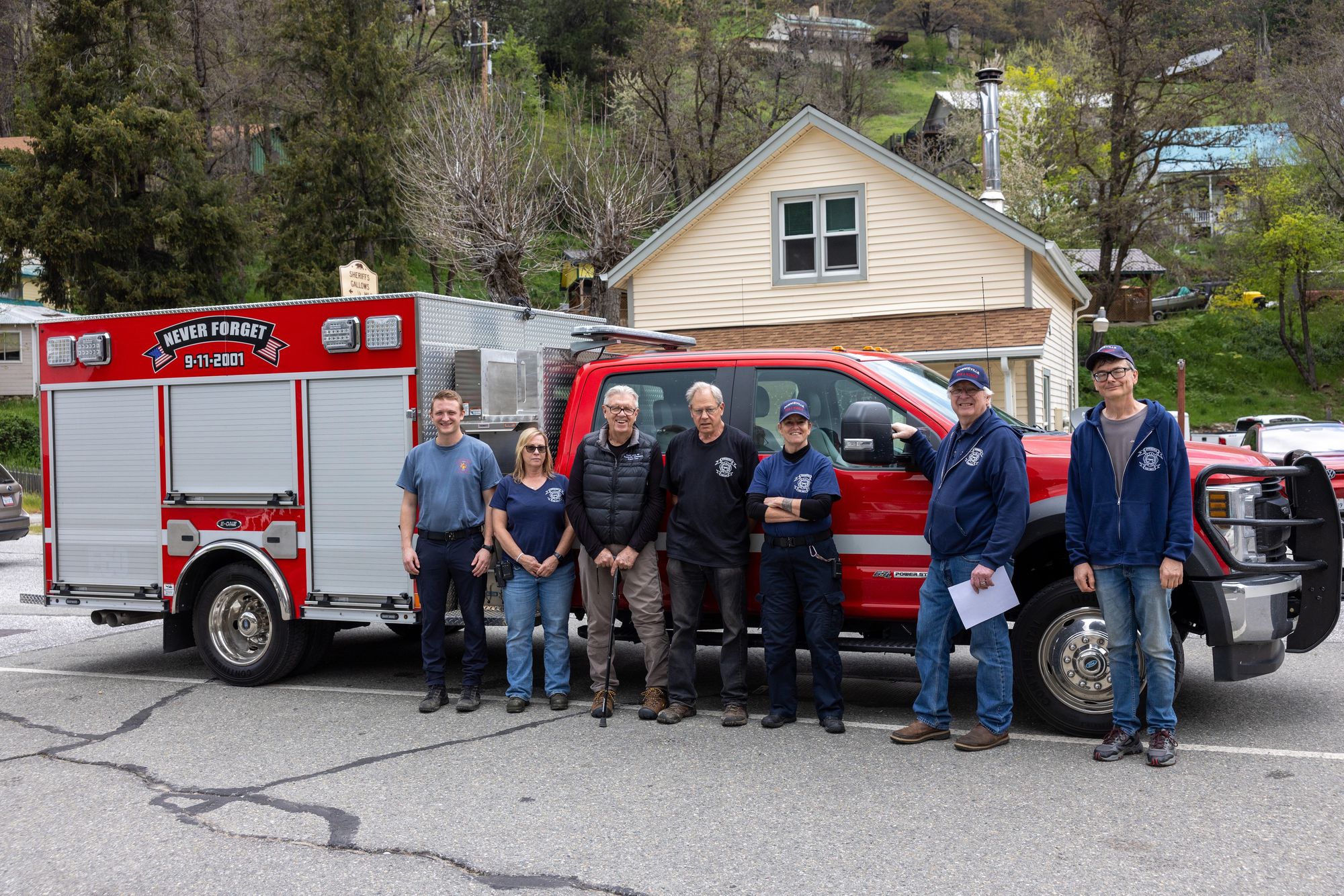 Downieville Fire Department volunteers and EMS staff in front of the newly delivered fire engine
