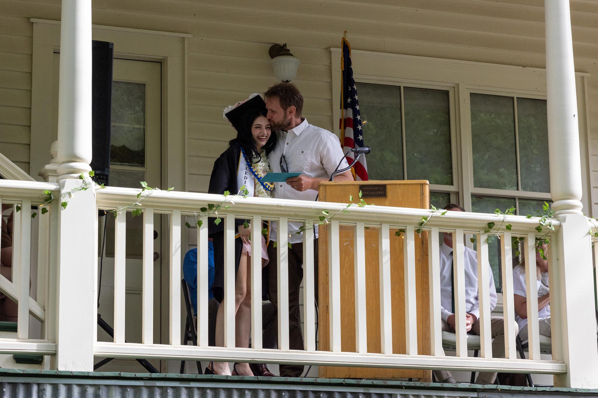 Abigail Sainsbury’s father presents a scholarship to his daughter
on behalf of E Clampus Vitus