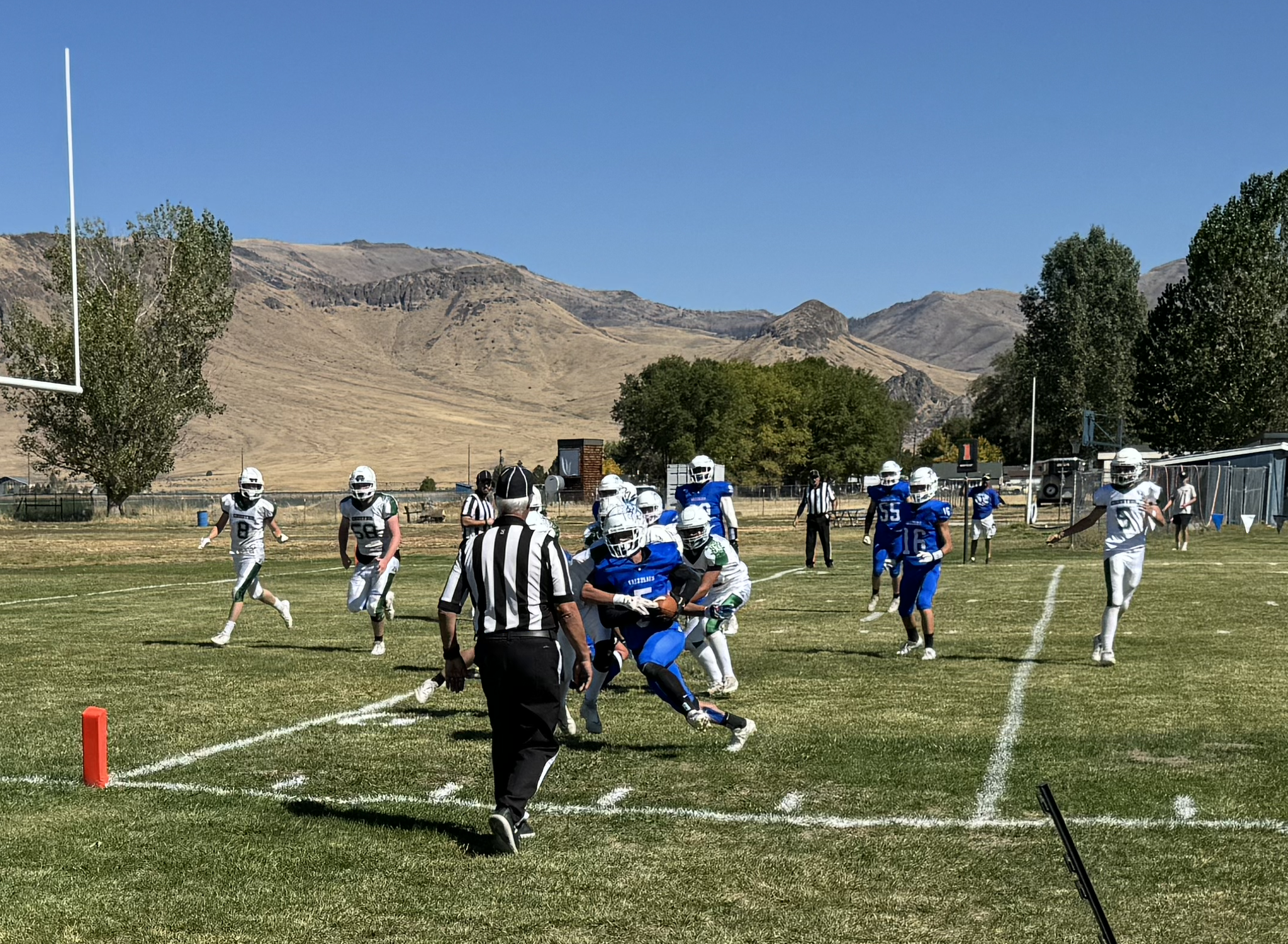 Having escaped the clutches of a Chester Volcano lineman, Ace Armstrong attempts to get the football across the goal line. Armstrong ran for 116 yards and caught a touchdown pass in the game.