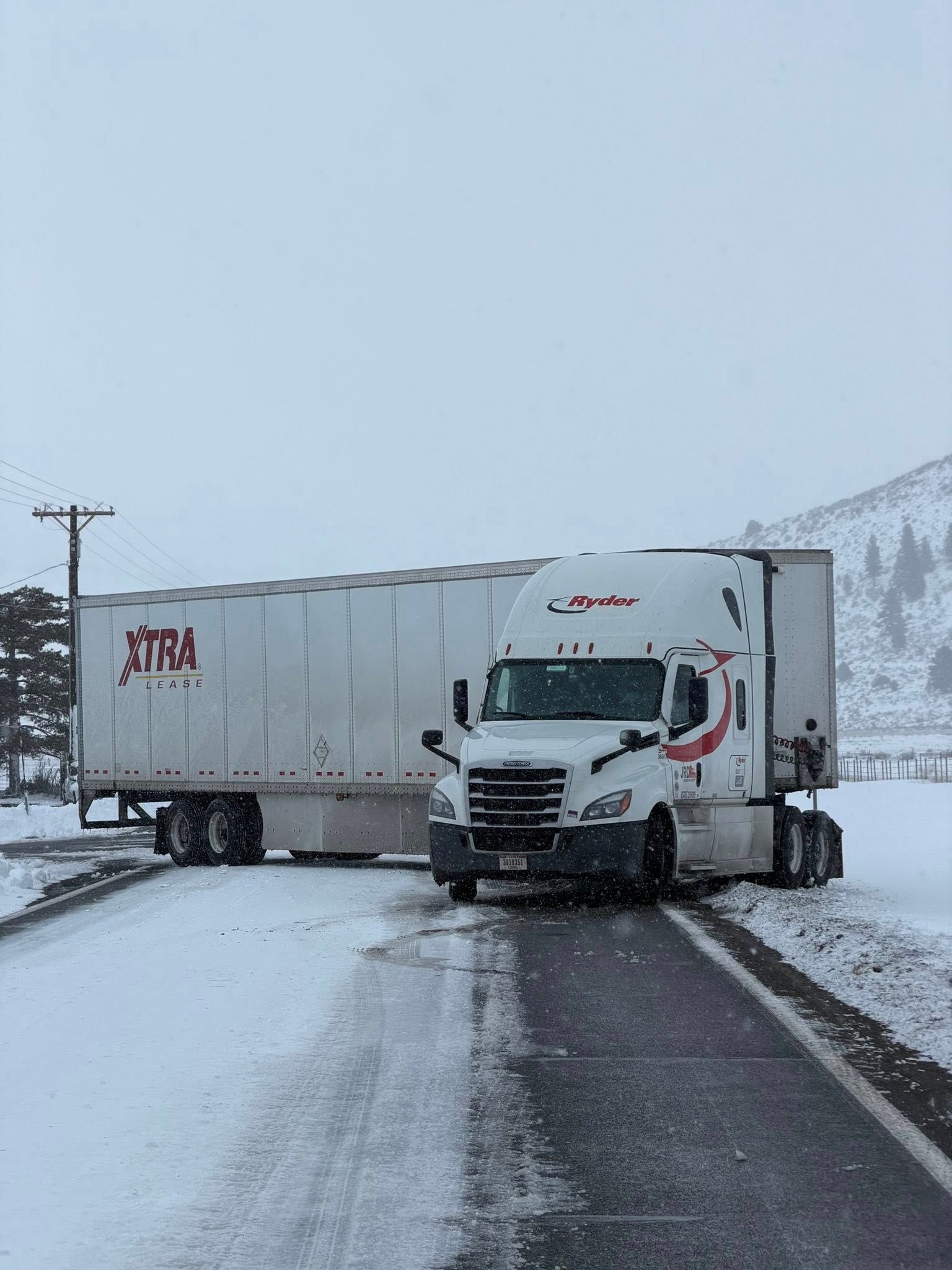 A big rig became stuck on Highway 49 in Loyalton, and its driver was later cited chain violations. Credit: Sierra County Sheriff’s Office.