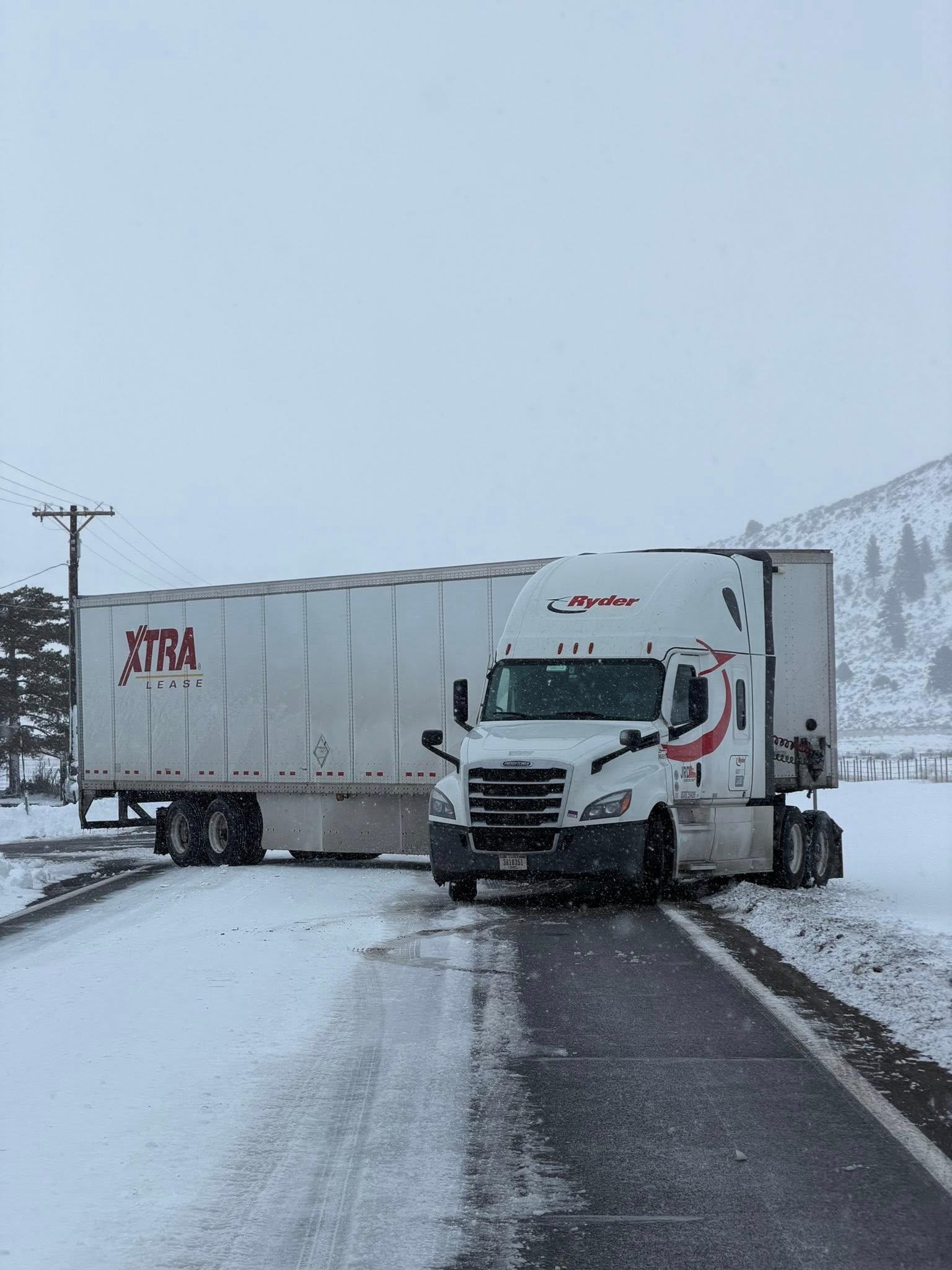 A big rig became stuck on Highway 49 in Loyalton, and its driver was later cited chain violations. Credit: Sierra County Sheriff’s Office.
