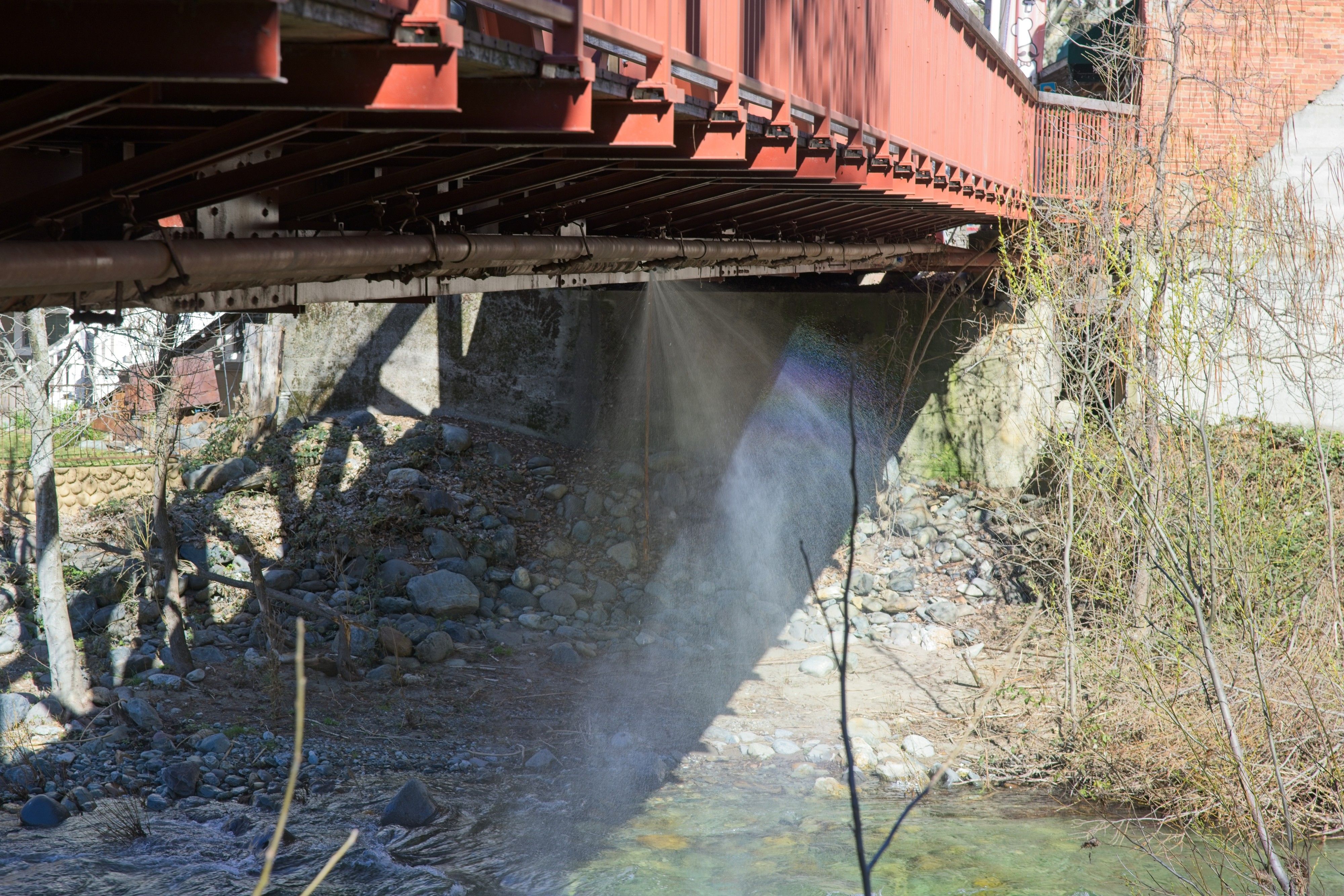 A water pipe under the Highway 49 bridge in Downieville sprang a leak on March 19. The growing number of repairs needed by the aging water system was cited as a reason for higher rates.
