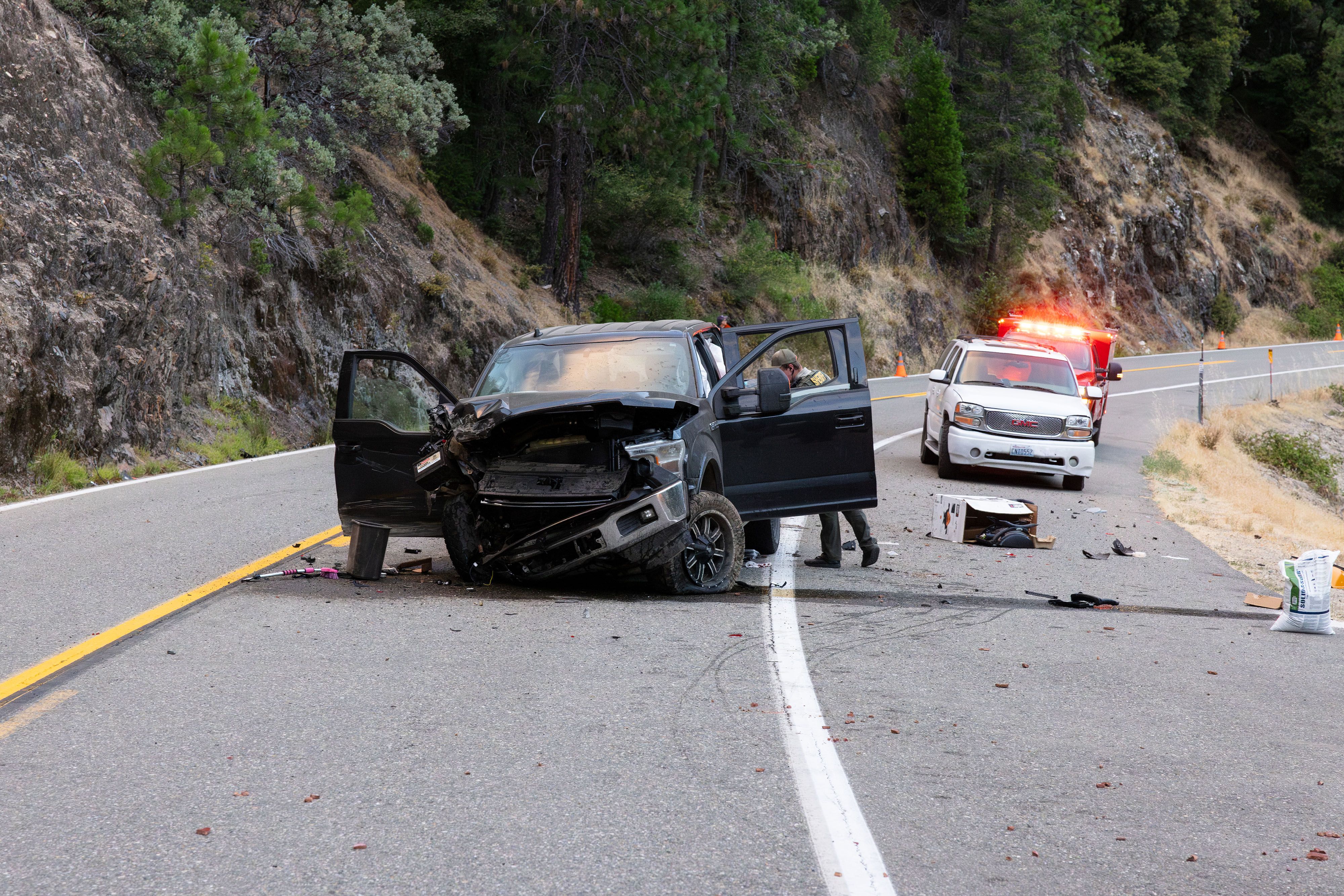 A Sierra County deputy investigates the crash across from the Yubaverse (formerly the Lure) resort.