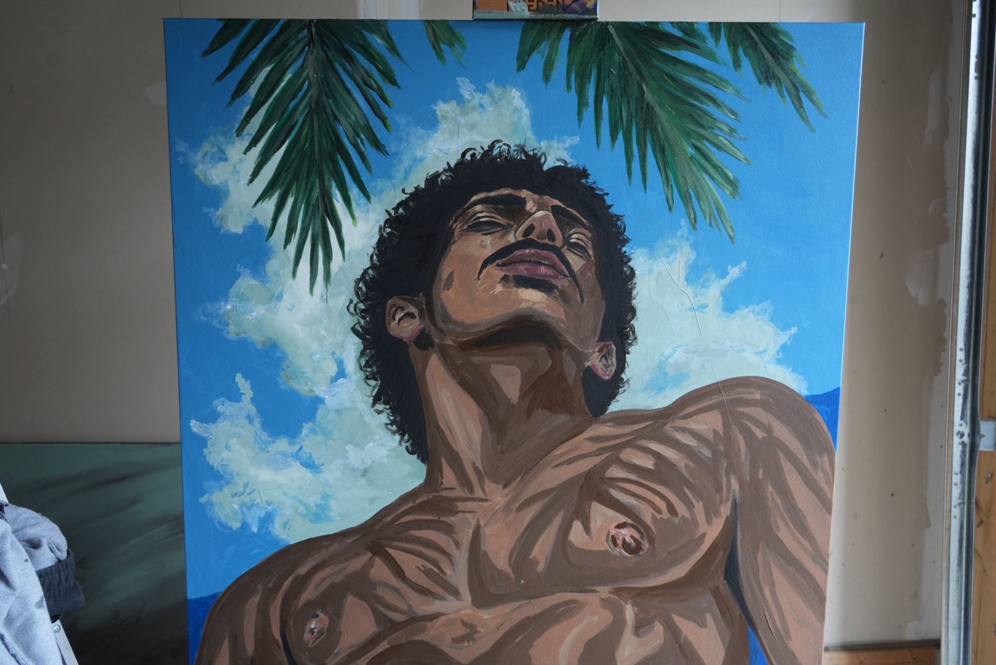 A painting by Manuel Murillo featuring a man on a blue background with palm trees
