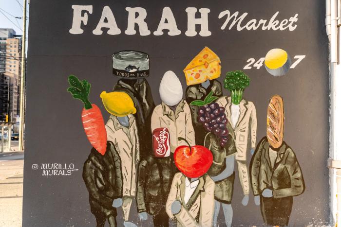 A mural for Farah Foods in Waterloo, Ontario featuring vegetable and pizza people