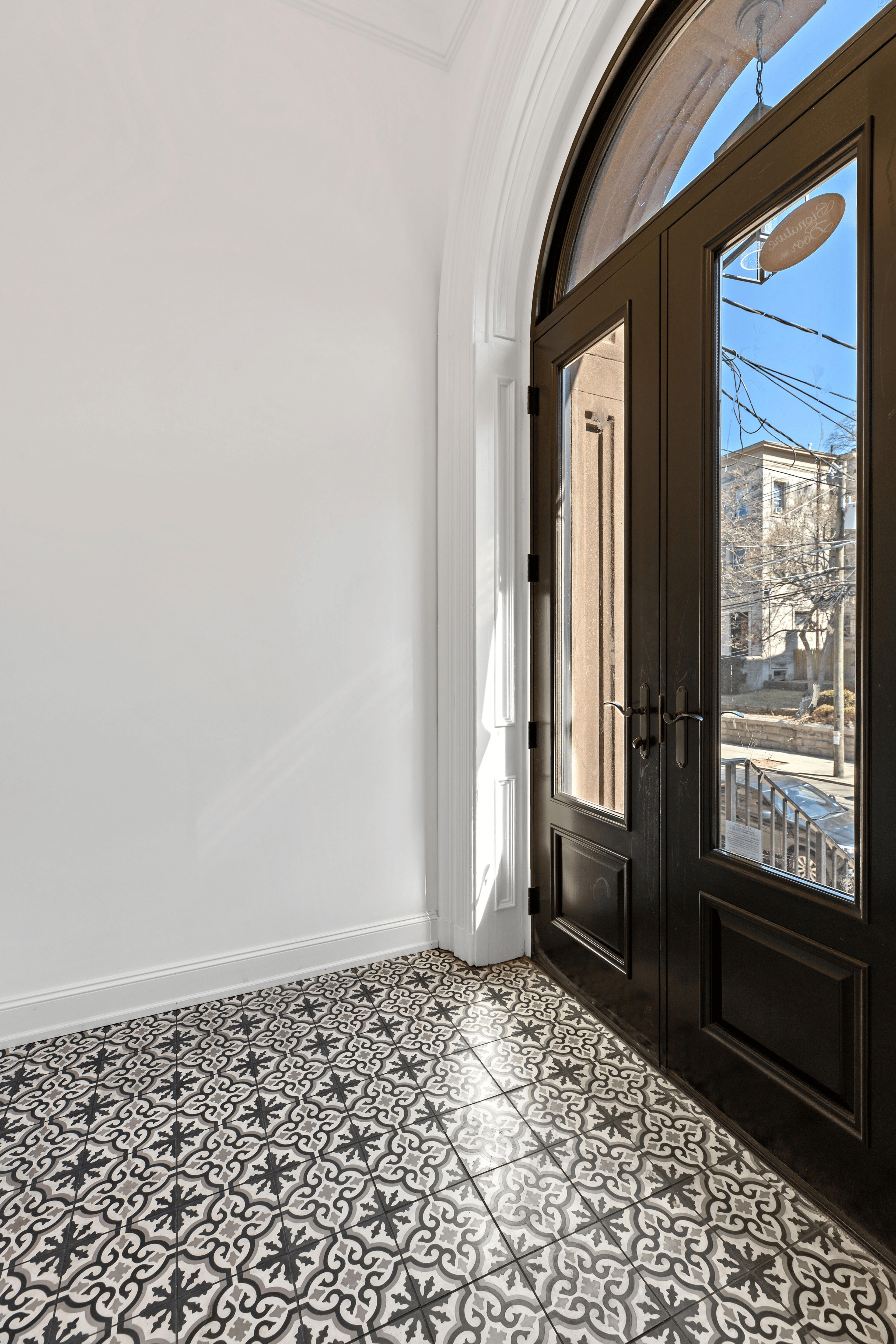 RESTORED LOBBY OF 826 HUDSON STREET PROJECT, PHOTO COURTESY AMANAT PROPERTIES.