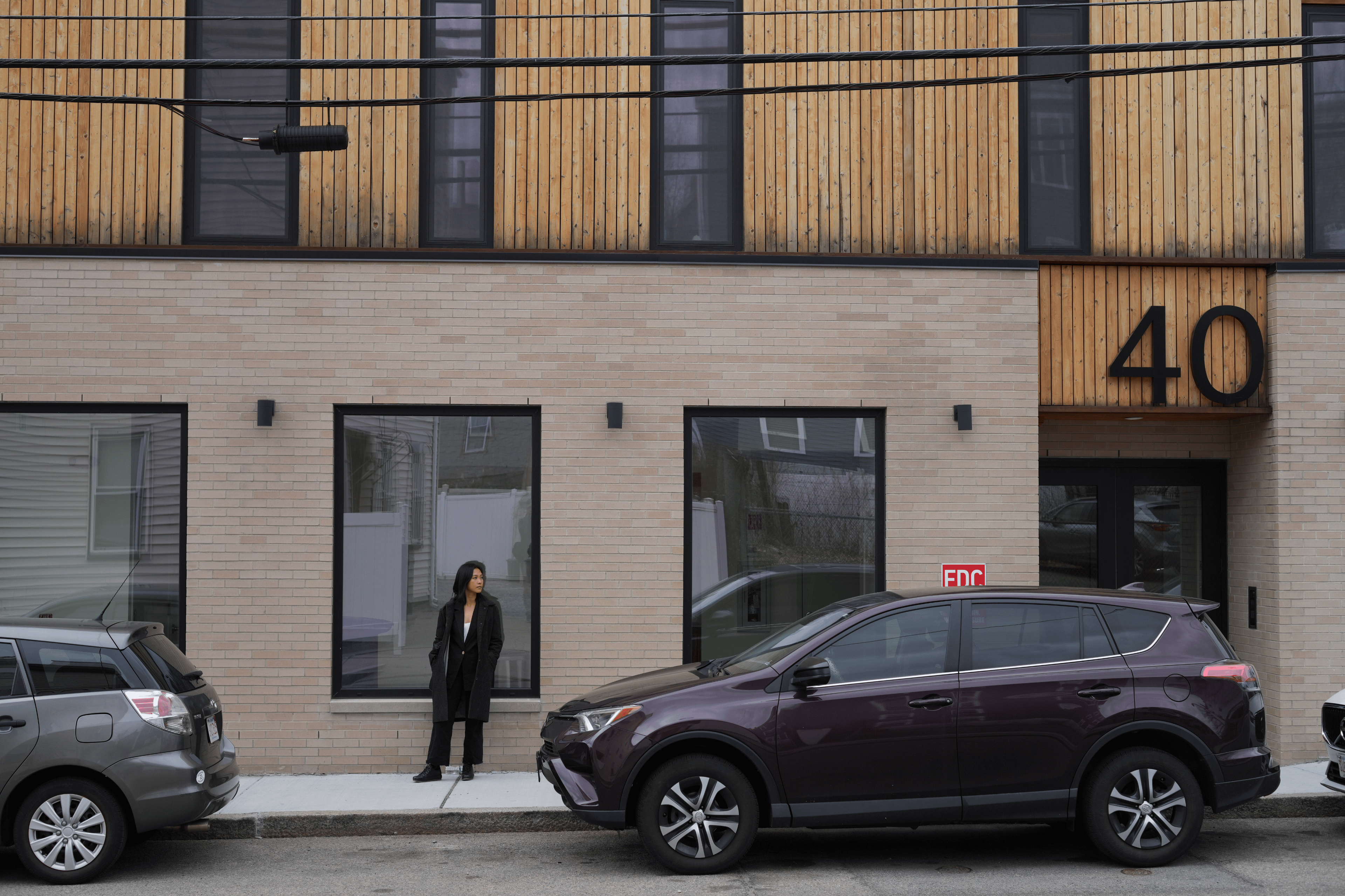 JENNY IN FRONT OF PRIMARY’S 40 TERRACE STREET MULTIFAMILY PROJECT IN BOSTON, MA.