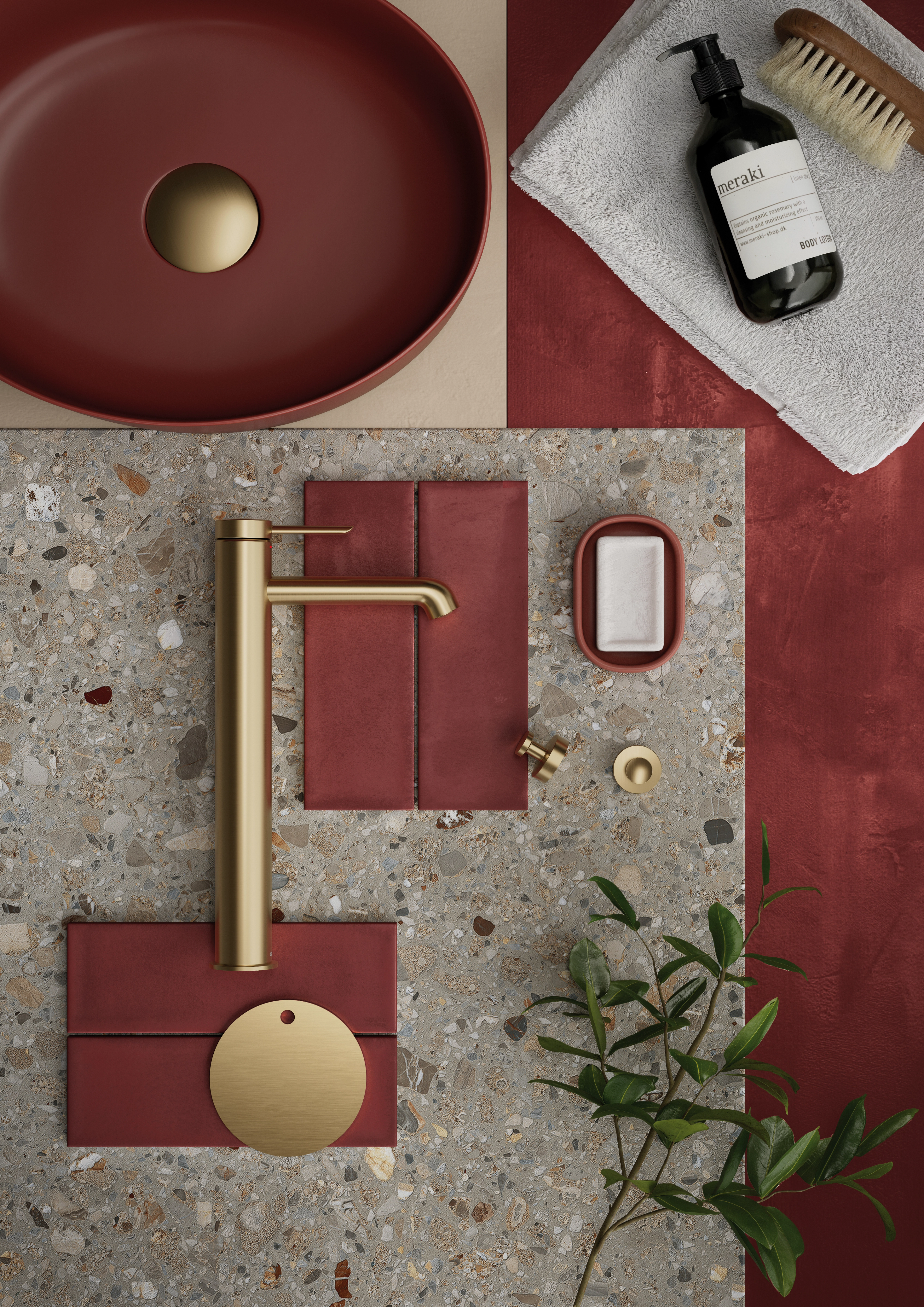 Flatlay med børstet bronse kraner, bunnventil, såpe og materialprøver.